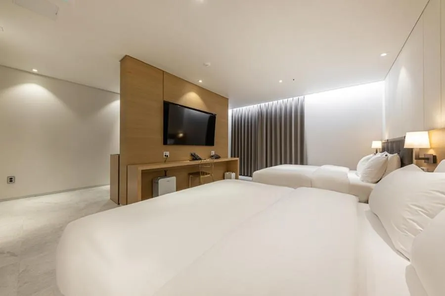 Bed in Masan Daisy Hotel