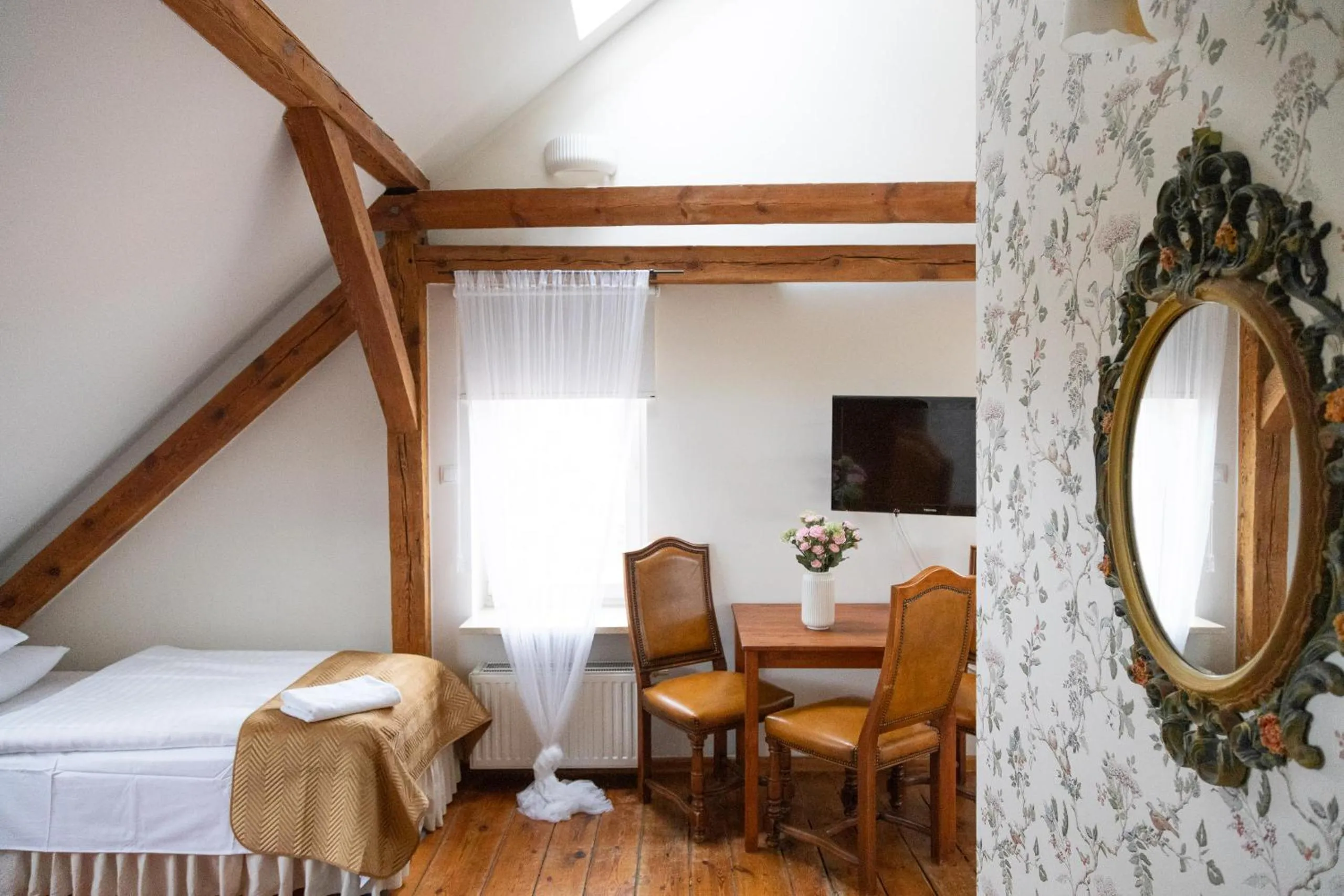 Bed in Mleczarnia Hotel Restauracja