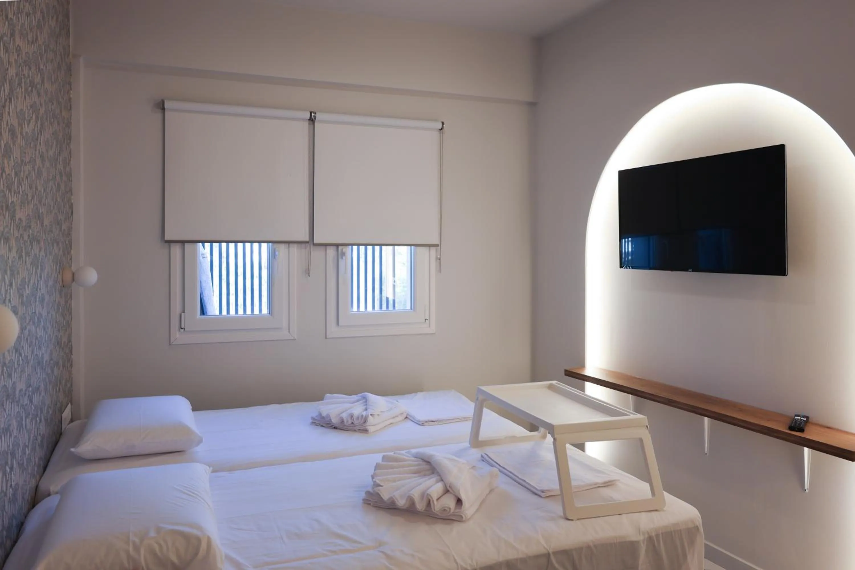 Bed in Uphill Unique Boutique Suites