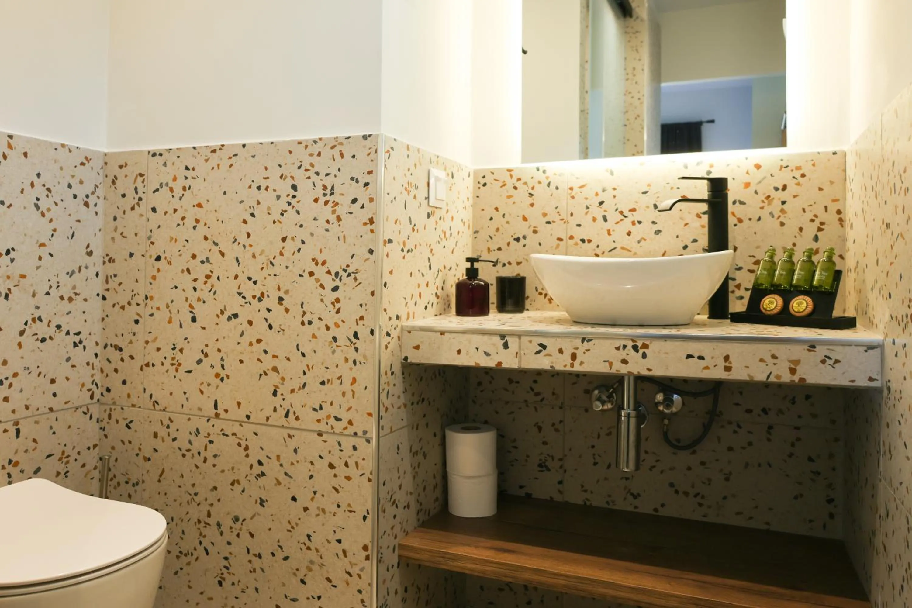 Toilet in Uphill Unique Boutique Suites