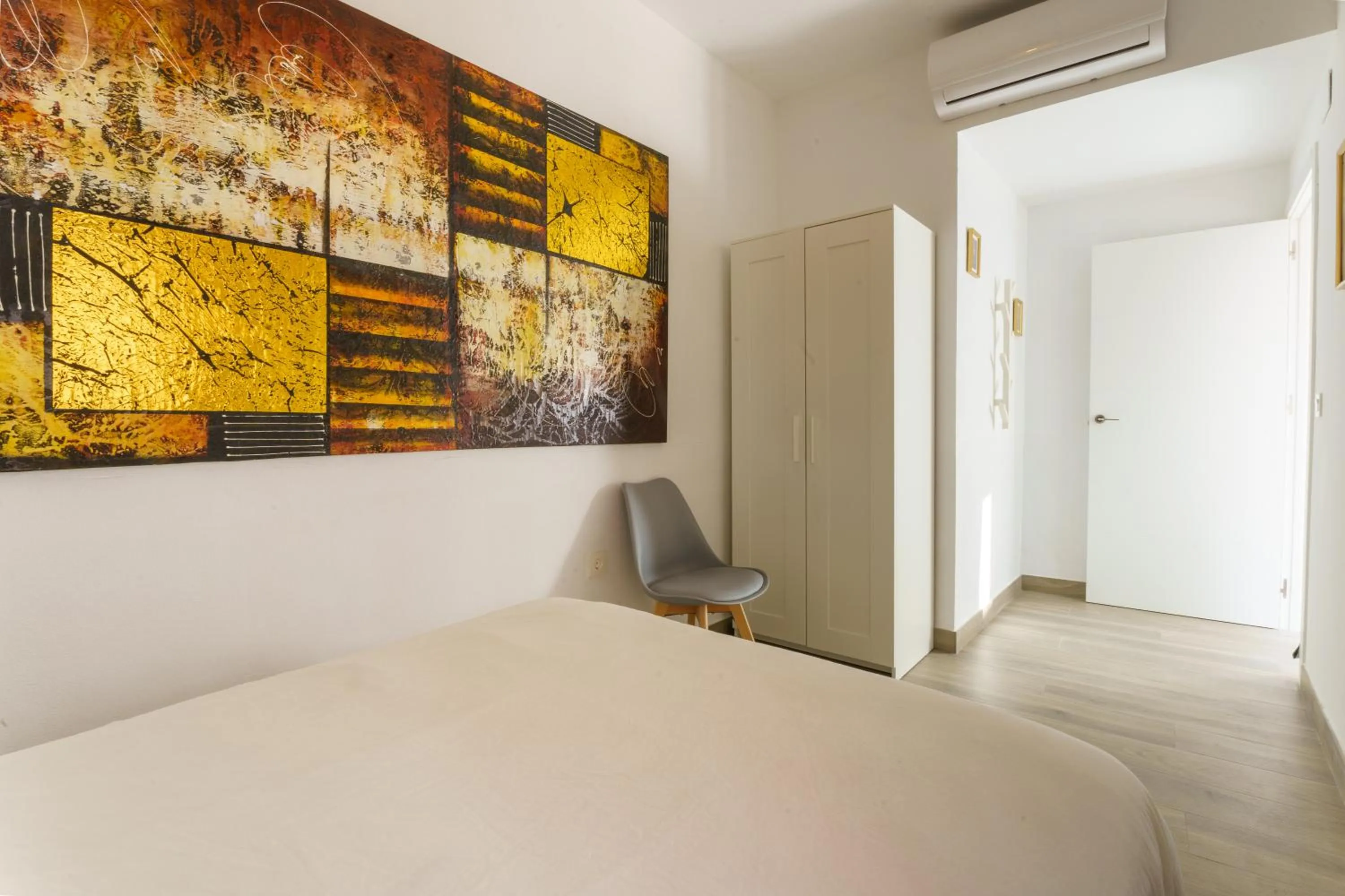 Photo of the whole room, Bed in APARTAMENTOS MAPAMUNDI