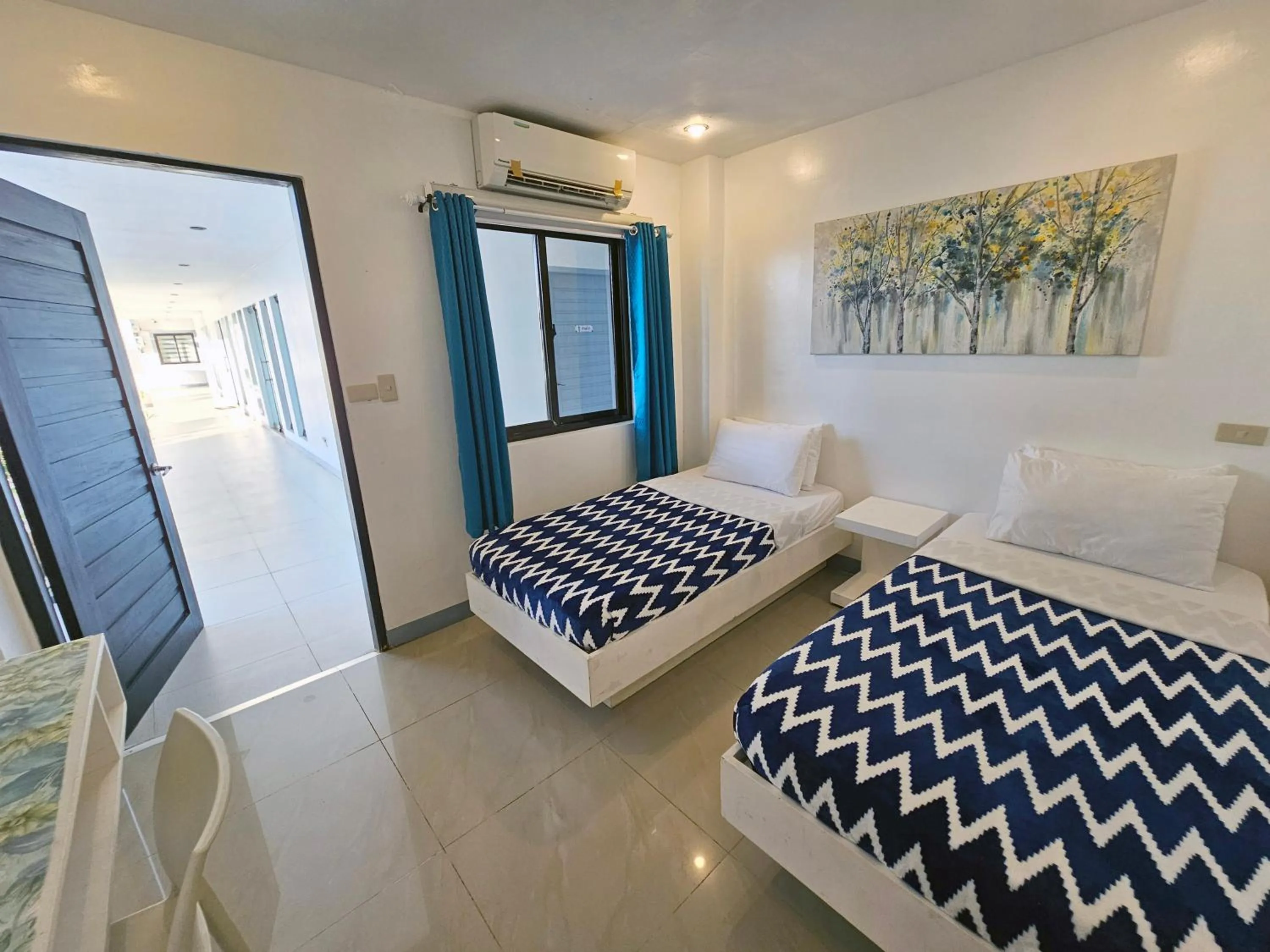 Bedroom in Blue Coast Beach Hotel