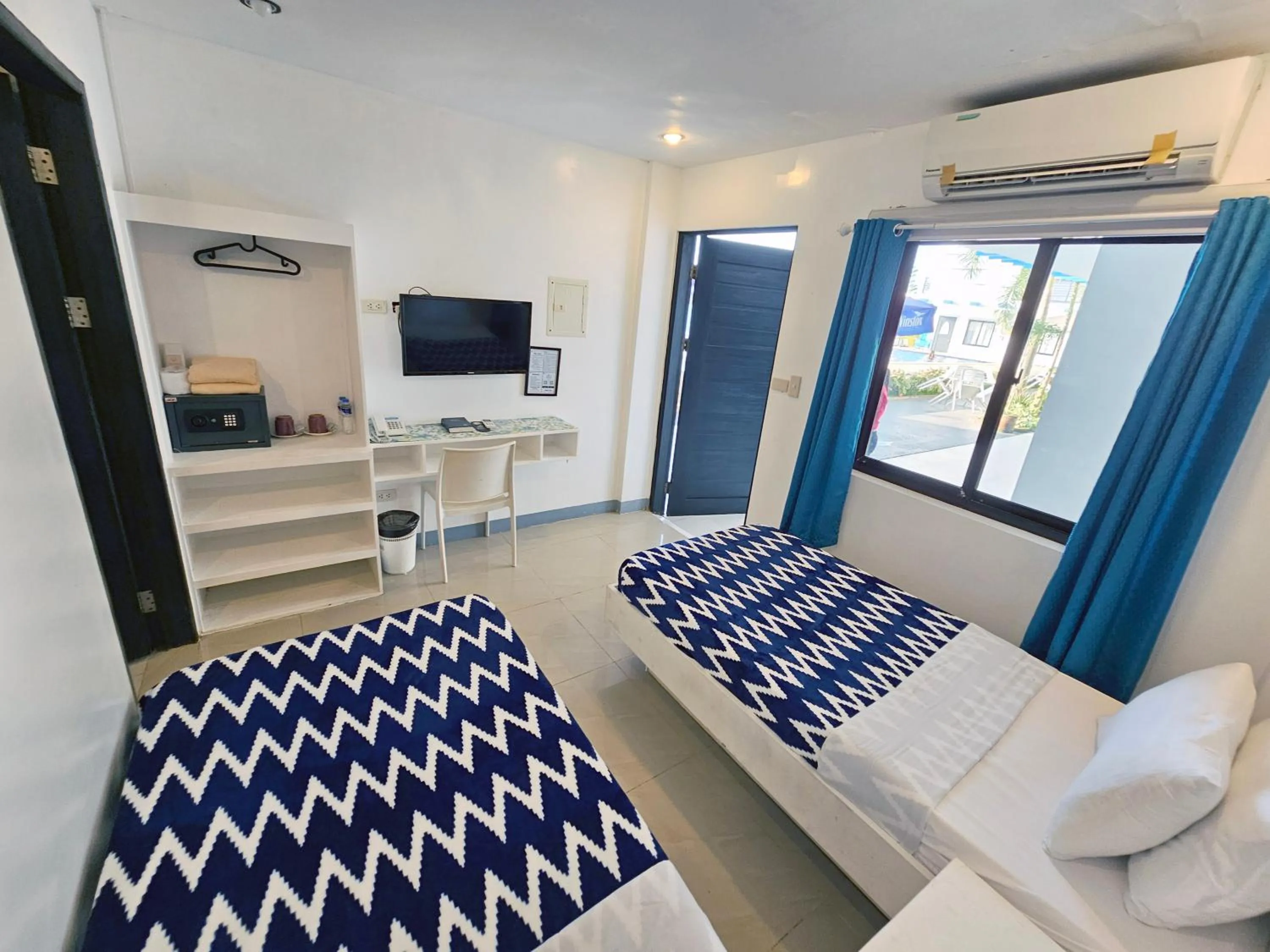Bedroom in Blue Coast Beach Hotel