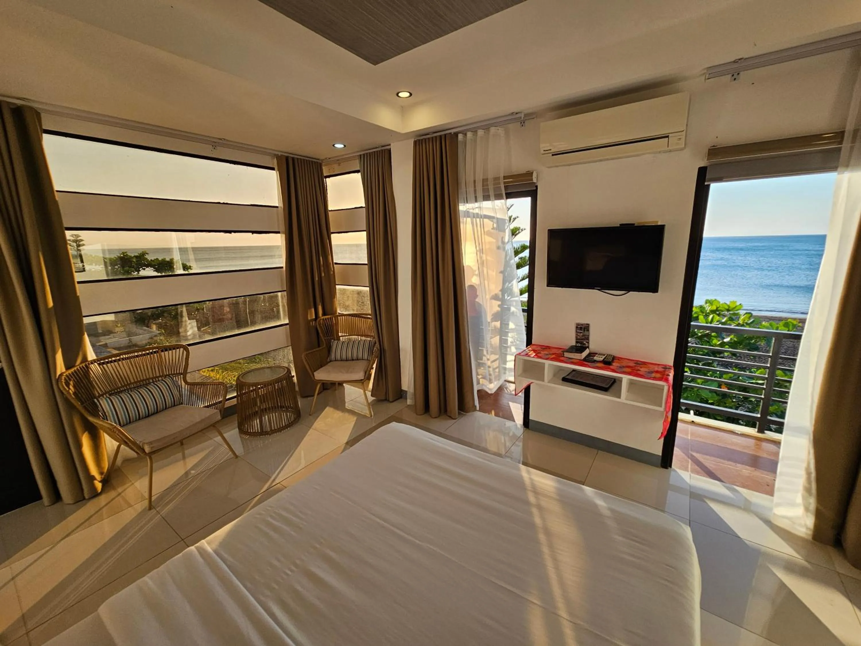 Bed in Blue Coast Beach Hotel