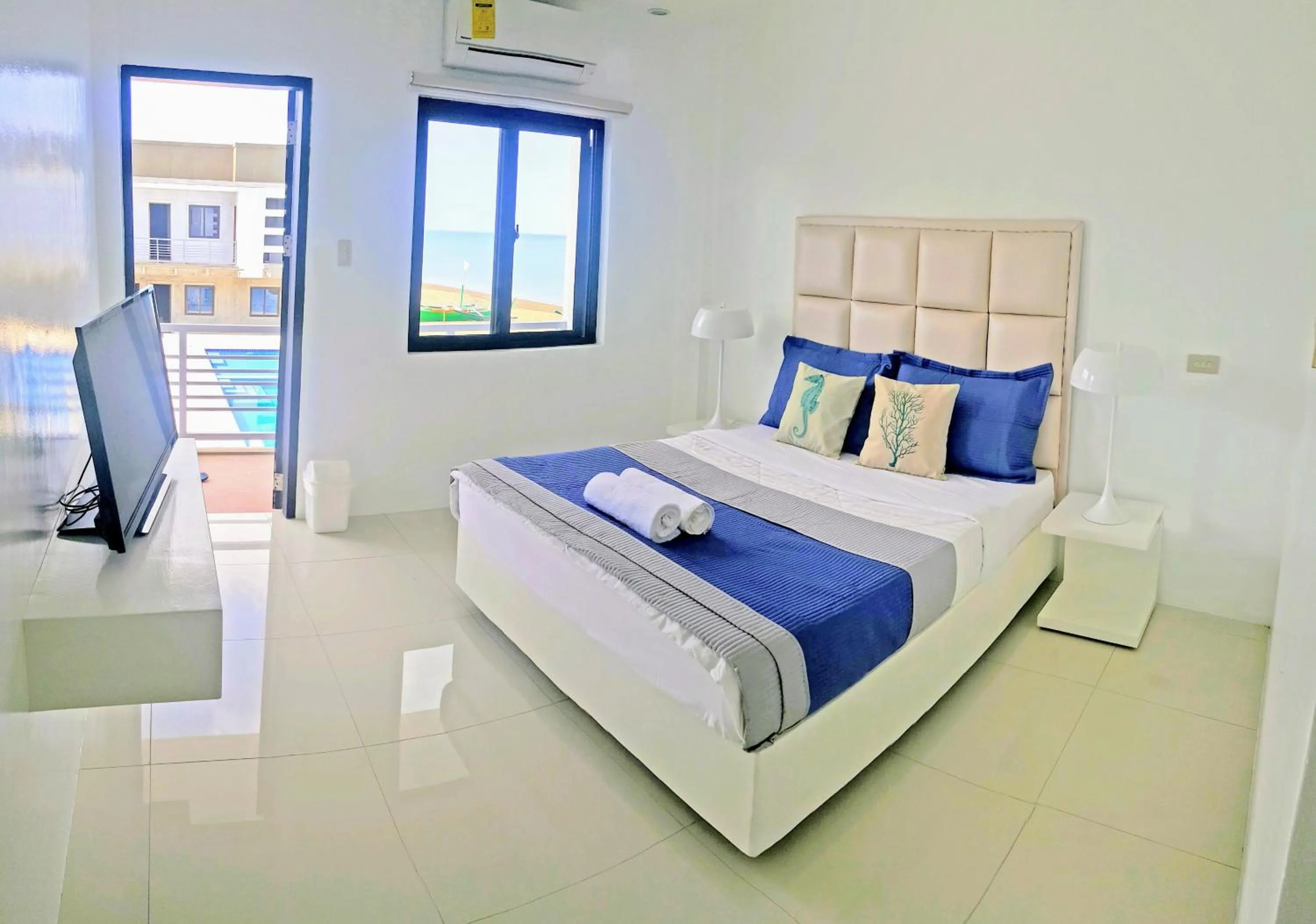 Bedroom in Blue Coast Beach Hotel