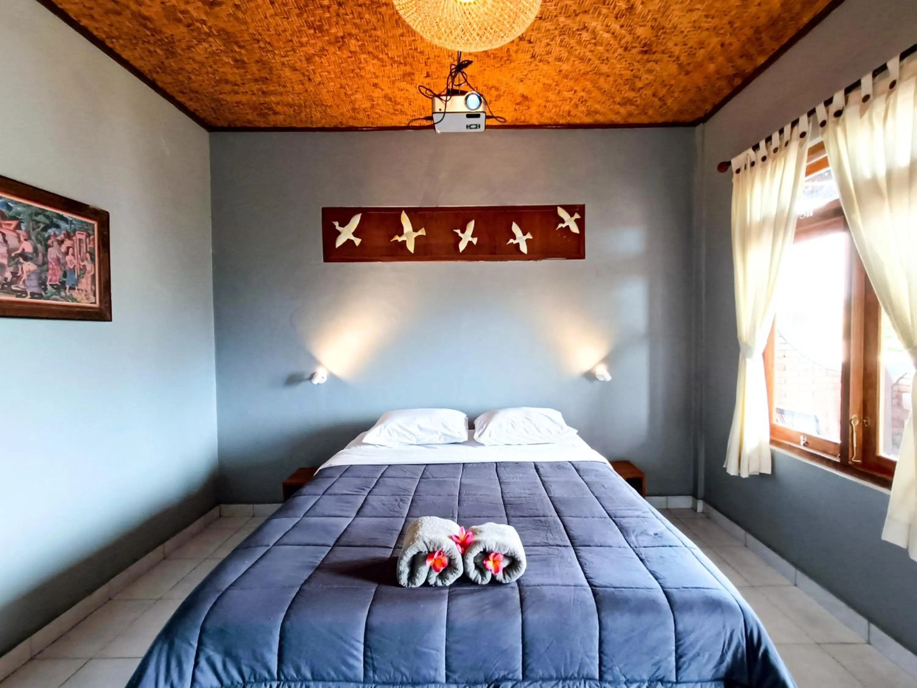 Bed in Nobody Inn Bali at Arya guest house