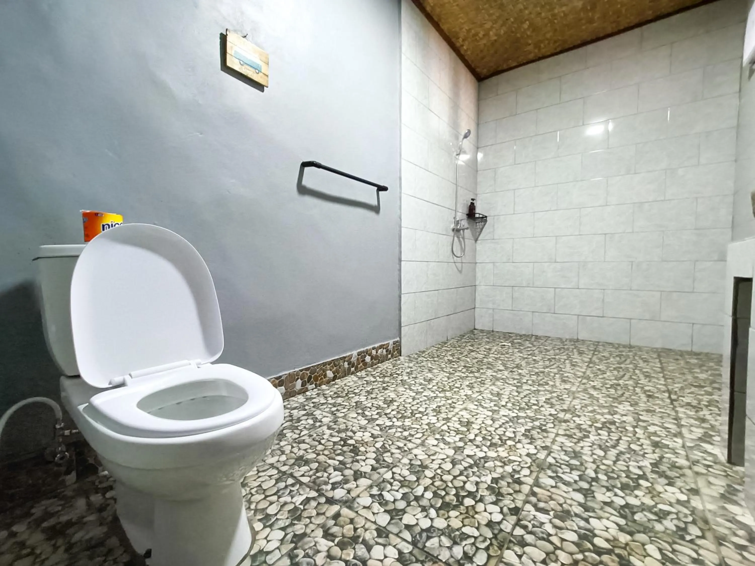 Shower in Nobody Inn Bali at Arya guest house