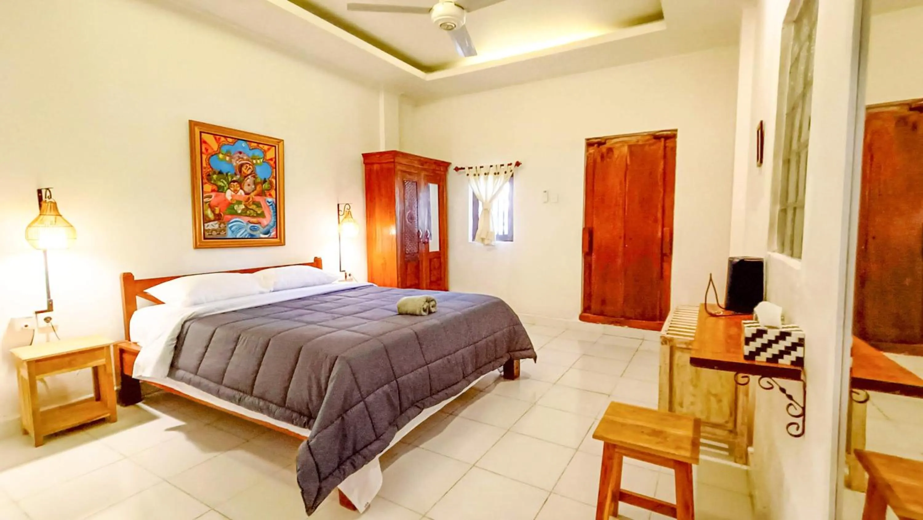 Bed in Nobody Inn Bali at Arya guest house