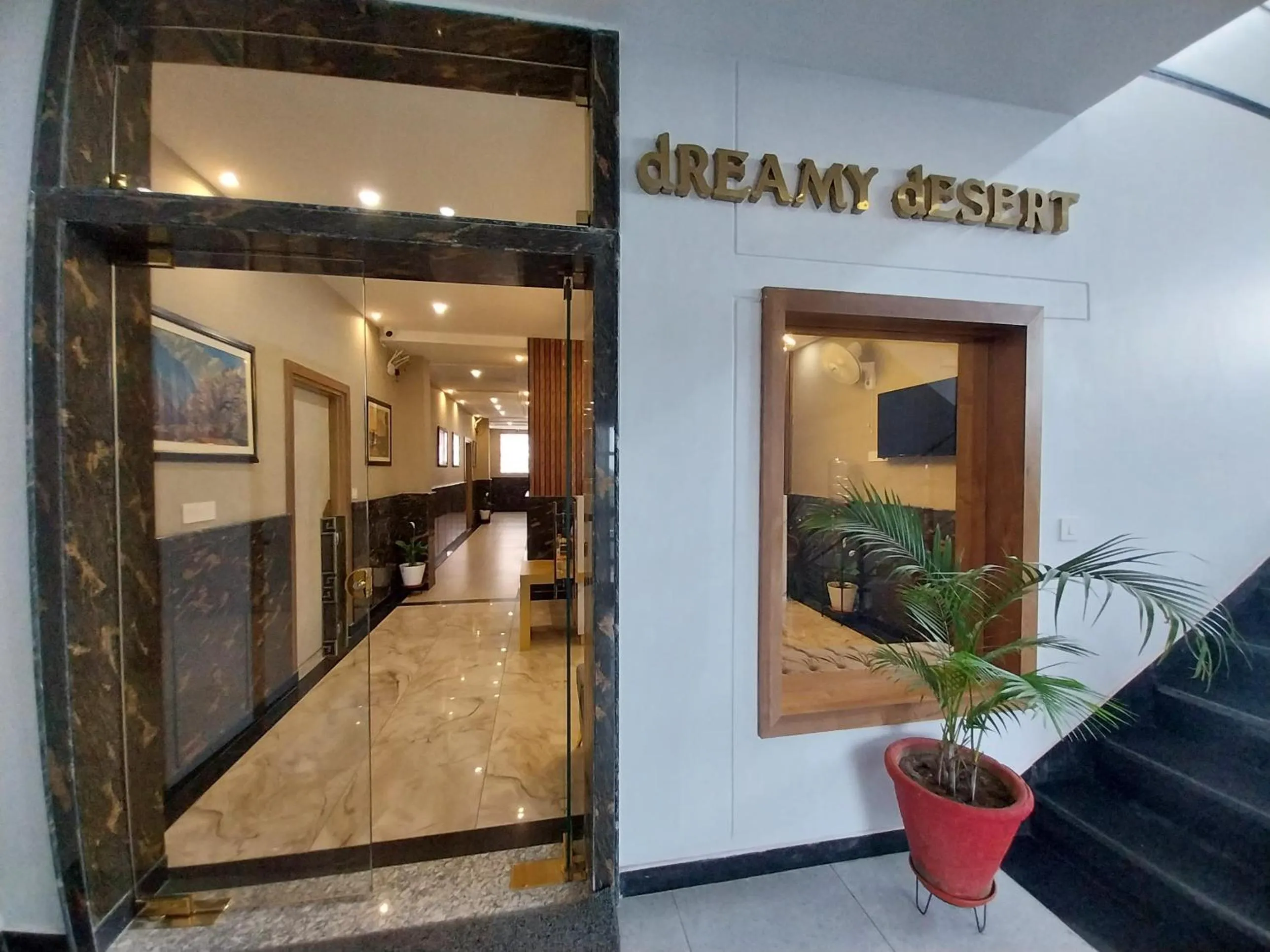 Property logo or sign in Dreamy Desert Hotel