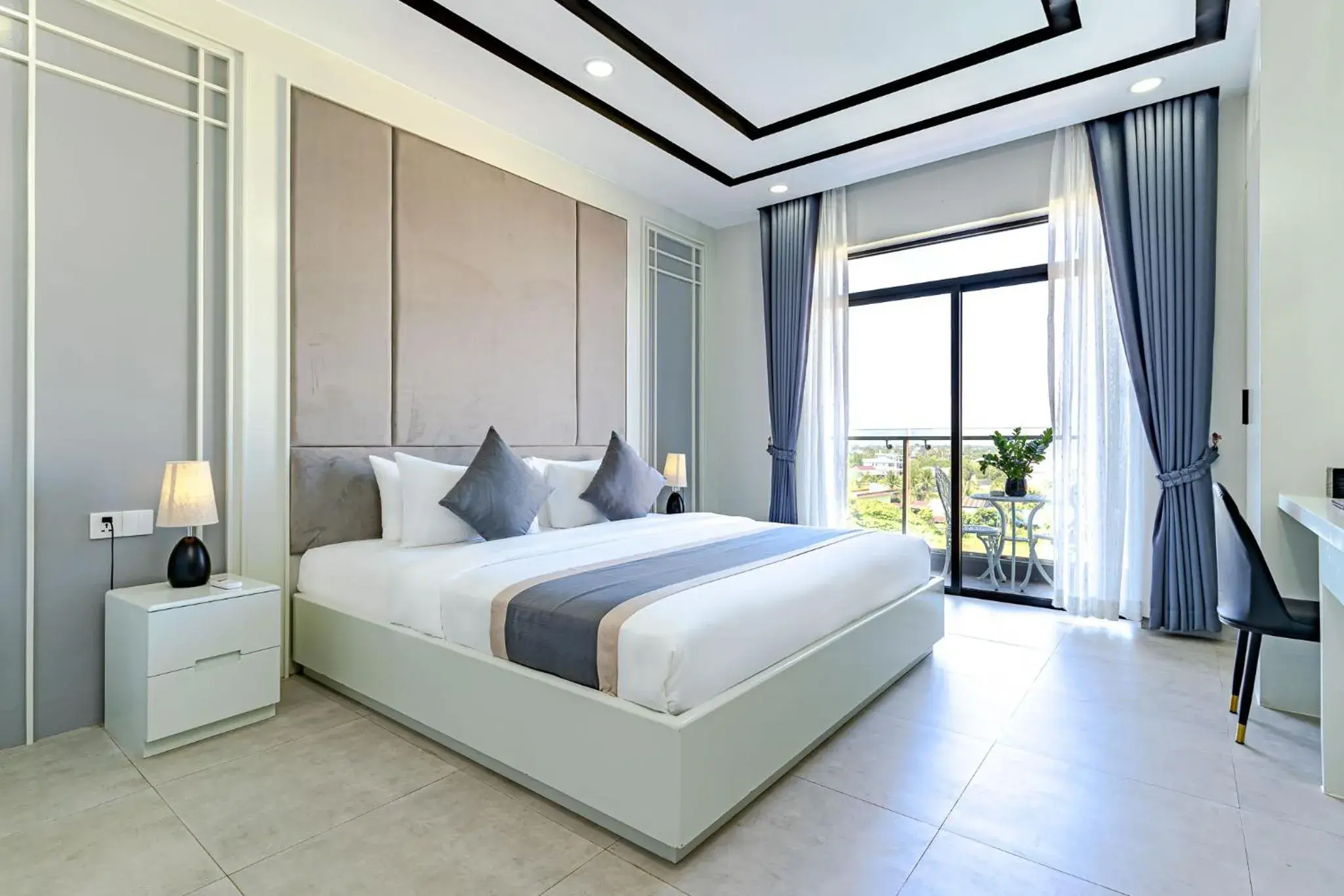 Deluxe Double Room with Balcony in The Square Kampot Hotel Deluxe Double Room with Balcony in The Square Kampot Hotel