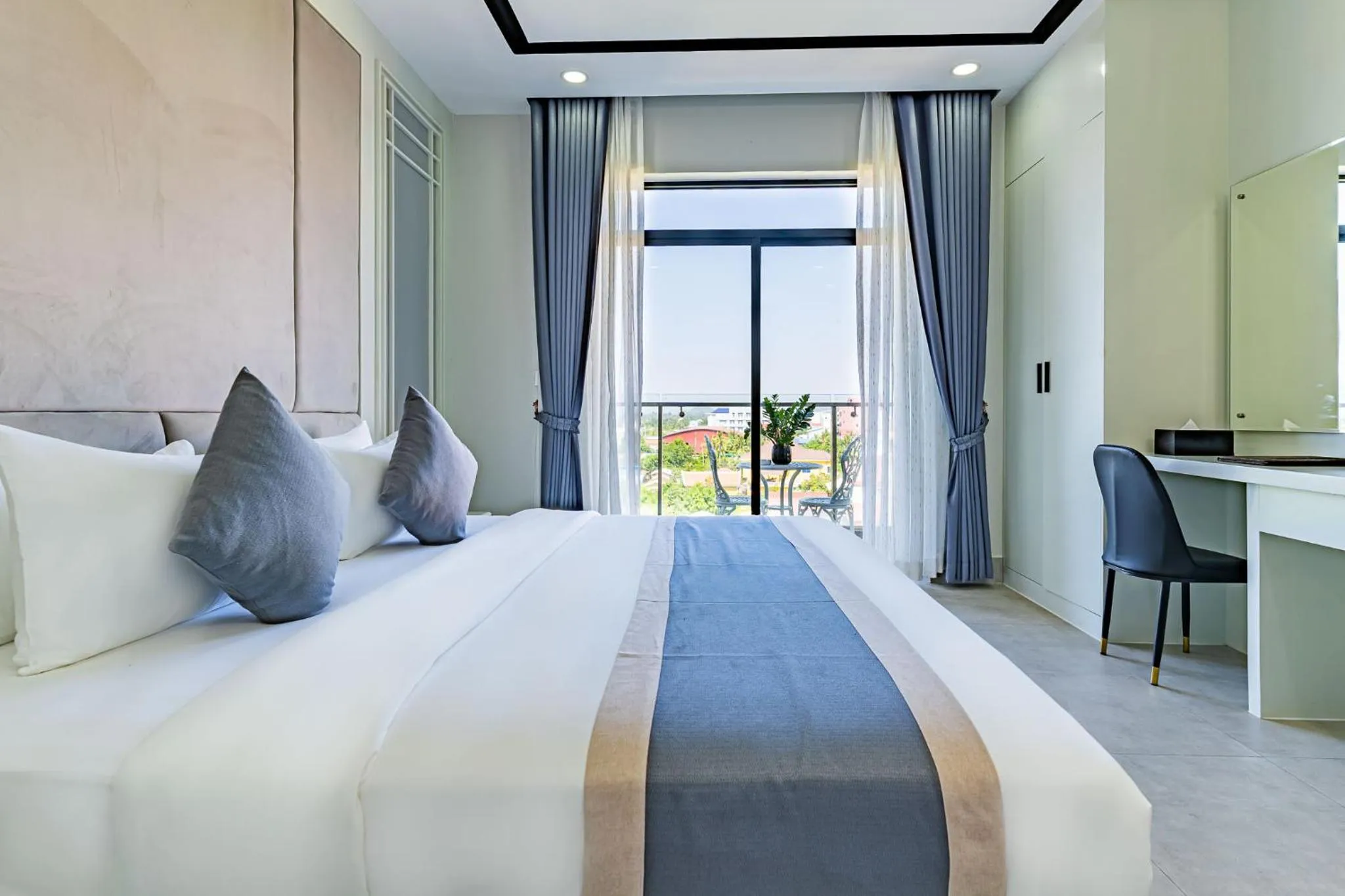 Bed in The Square Kampot Hotel