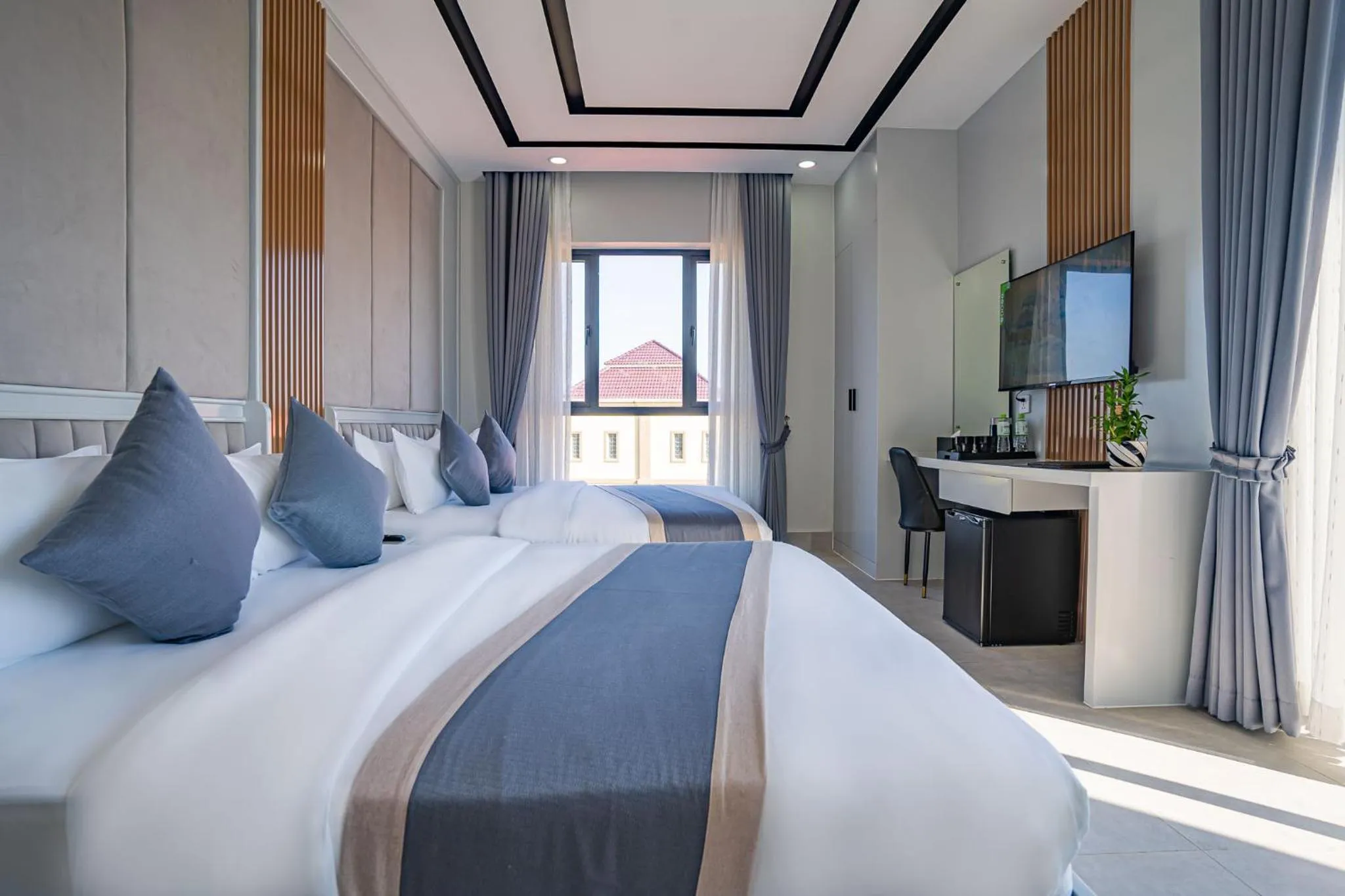 Bed in The Square Kampot Hotel