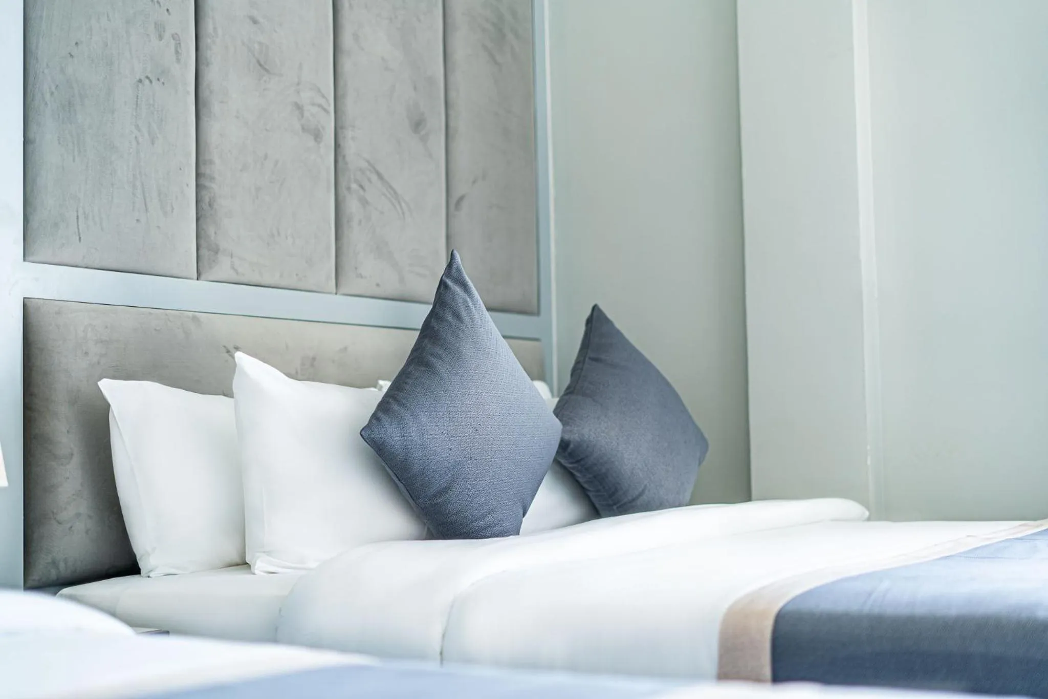 Bed in The Square Kampot Hotel