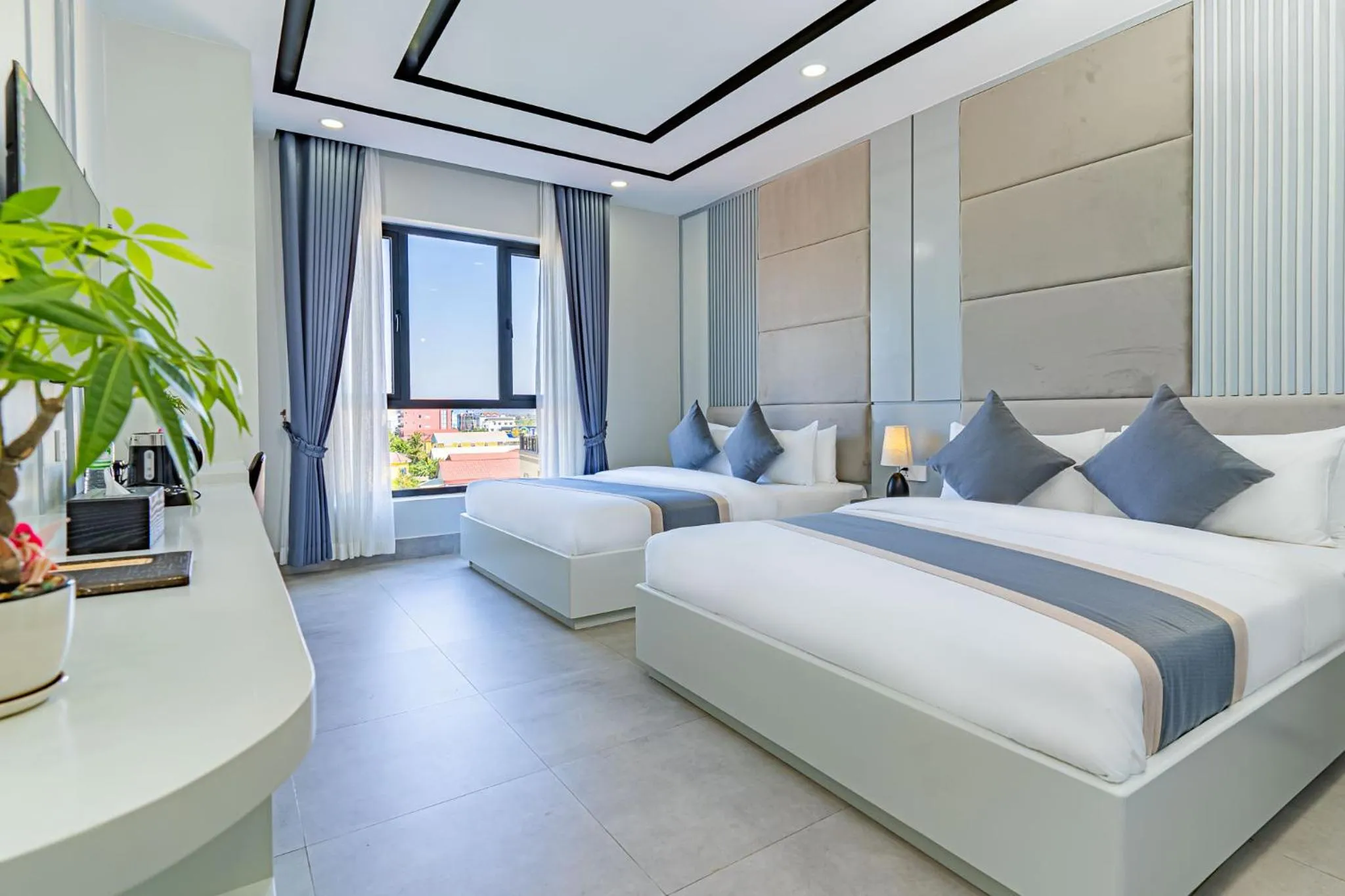 Bed in The Square Kampot Hotel