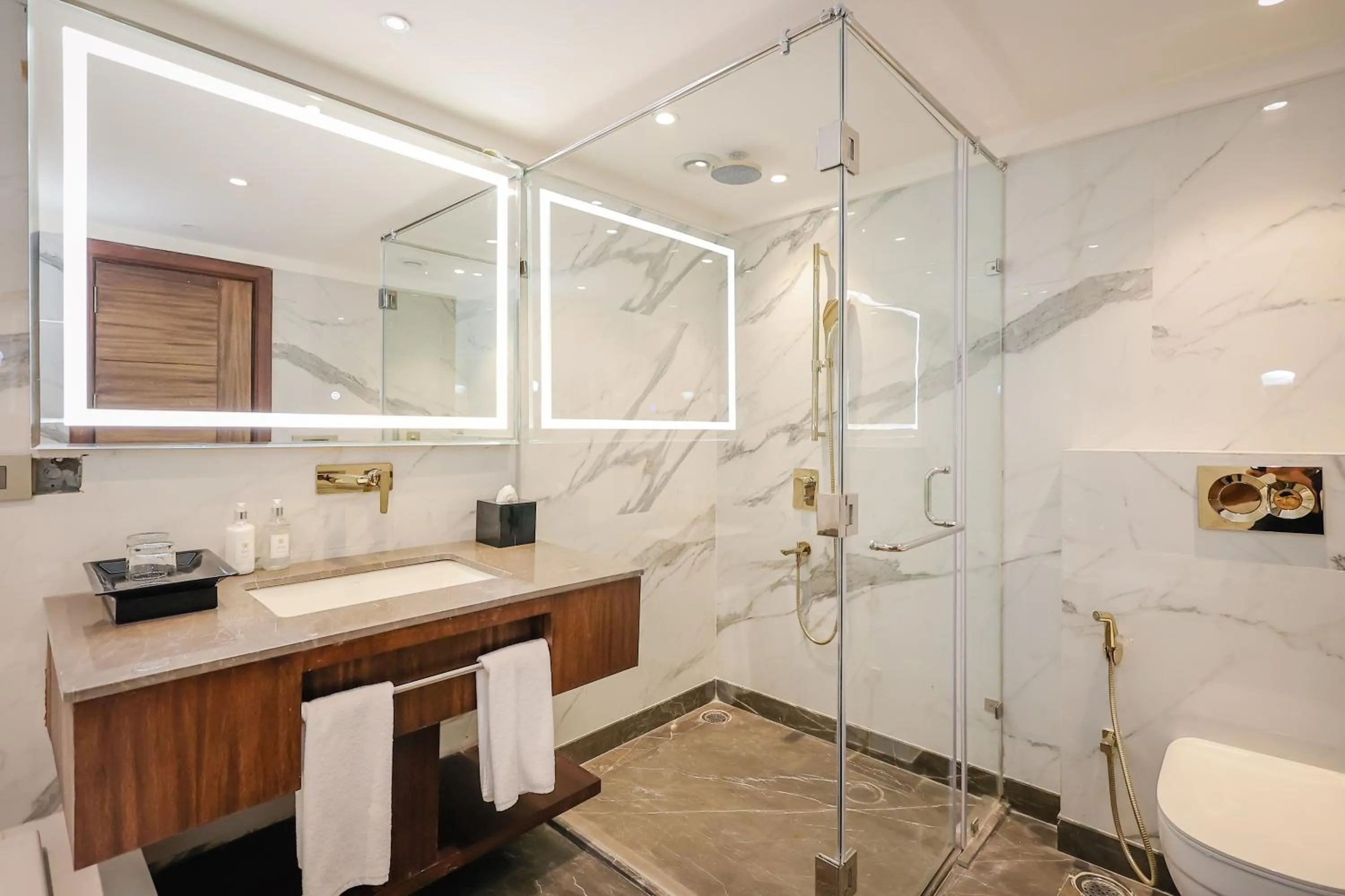 Bathroom in Regenta Dehradun by Royal Orchid Hotels Limited