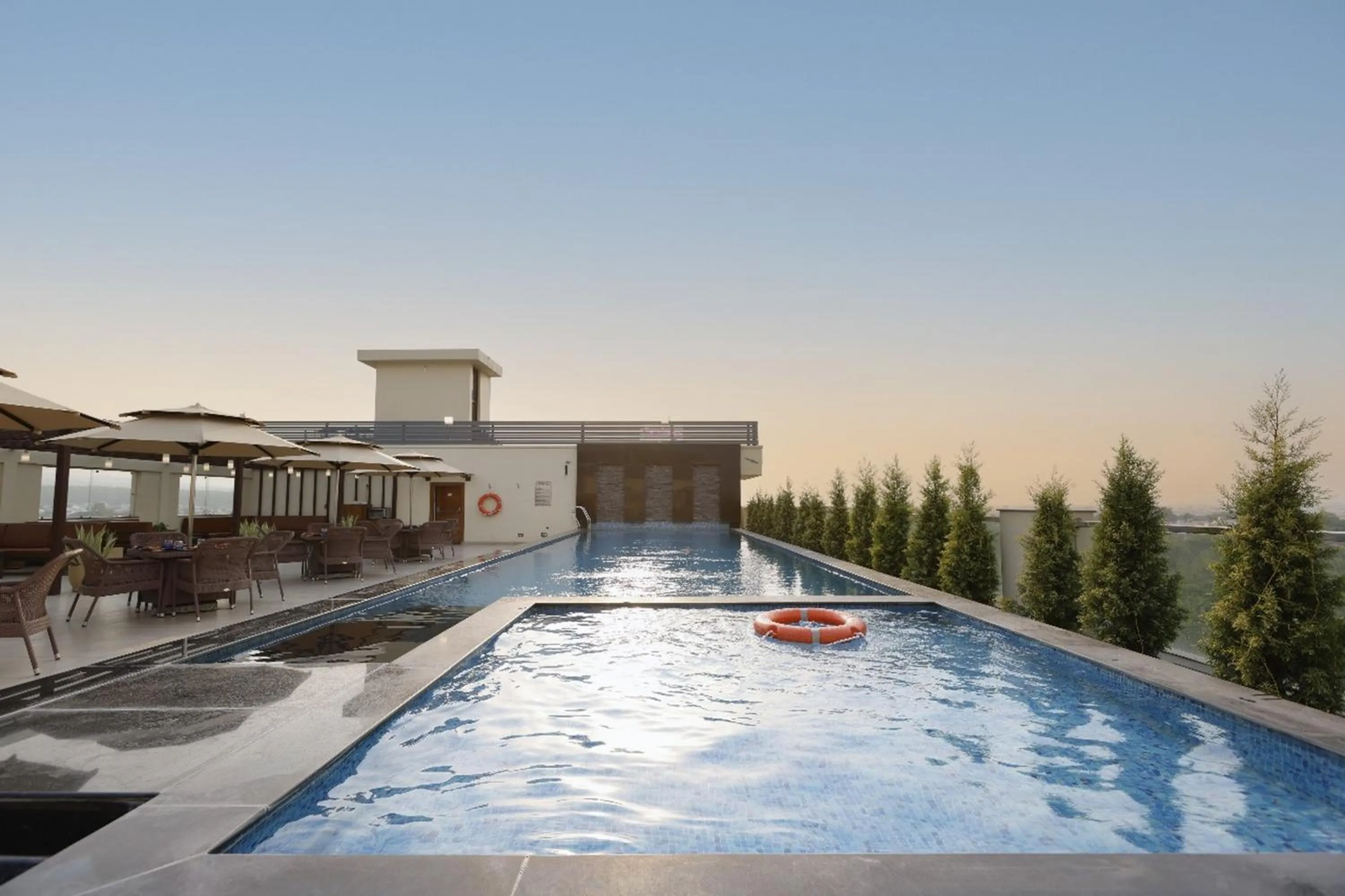 Swimming pool in Regenta Dehradun by Royal Orchid Hotels Limited