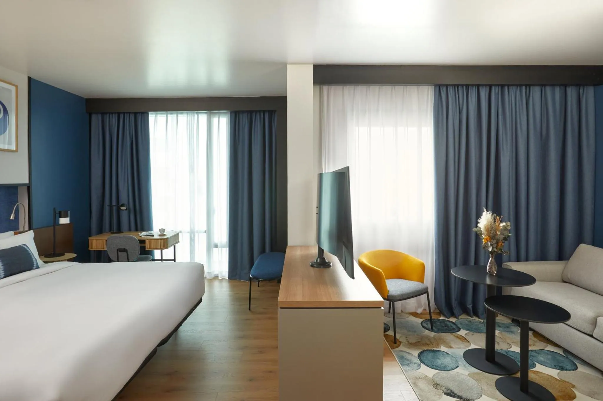 Photo of the whole room, Bed in Crowne Plaza Madrid - Centre Retiro by IHG