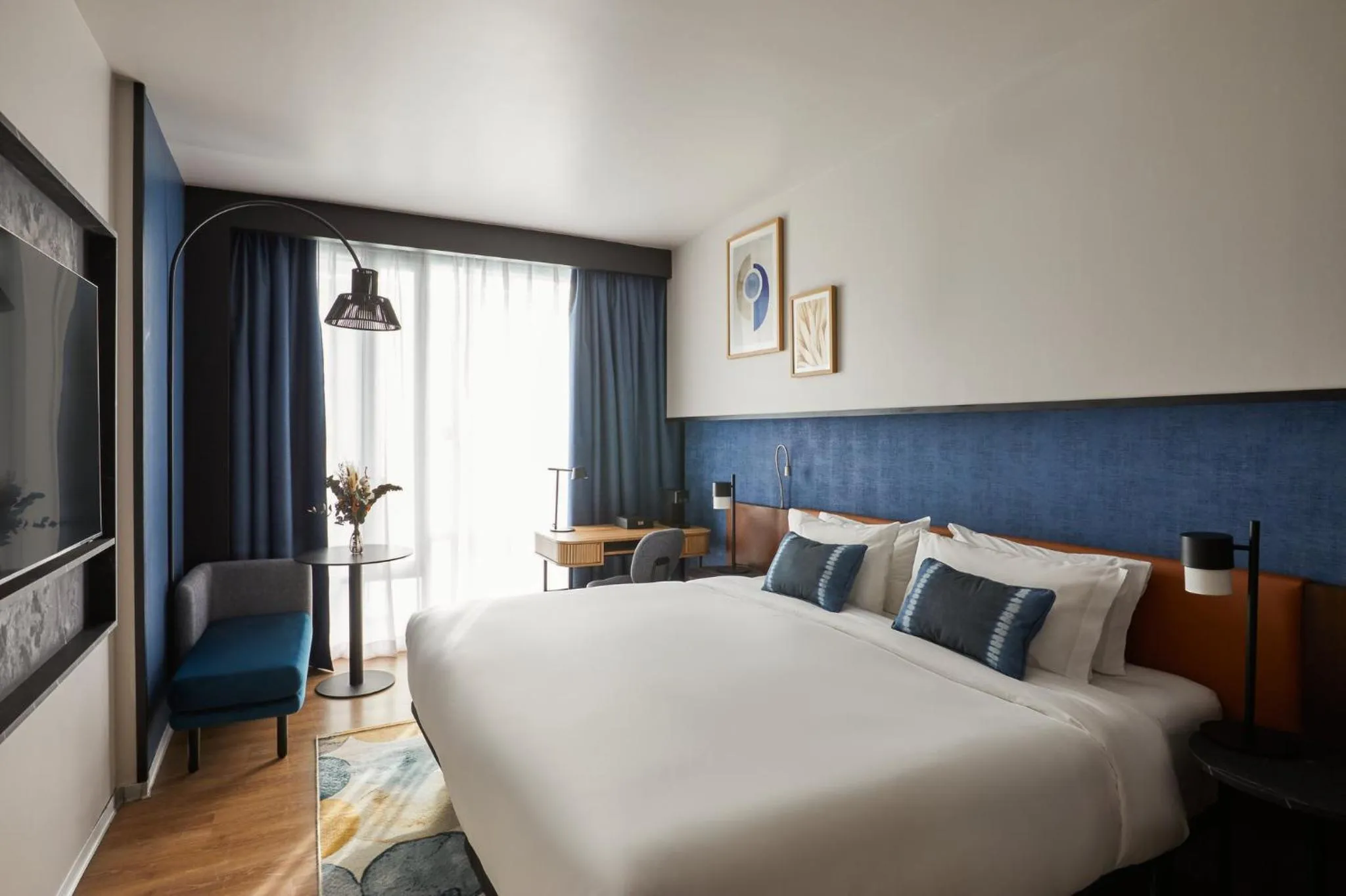 Photo of the whole room, Bed in Crowne Plaza Madrid - Centre Retiro by IHG