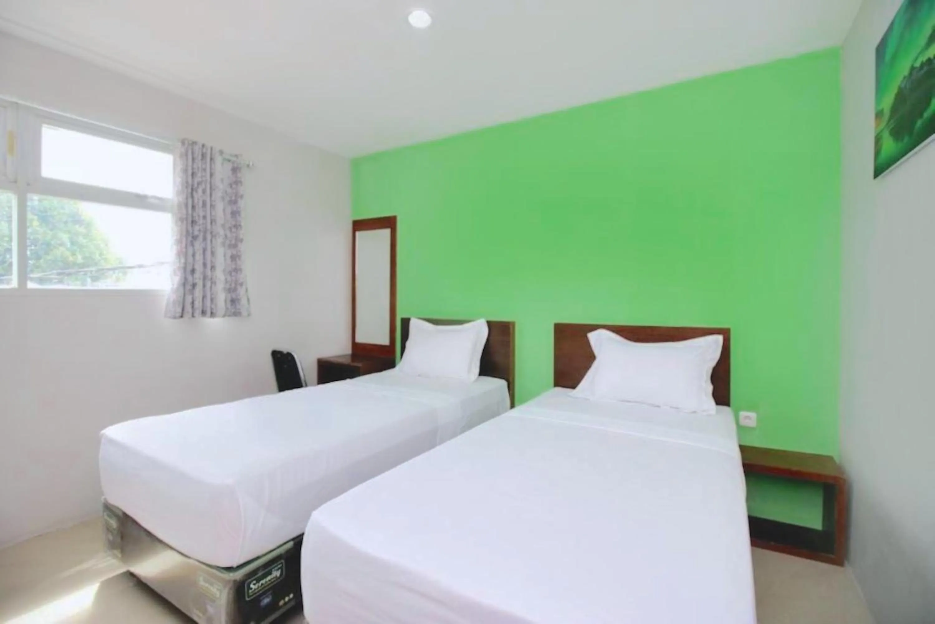 Bed in The Aurora by Makati