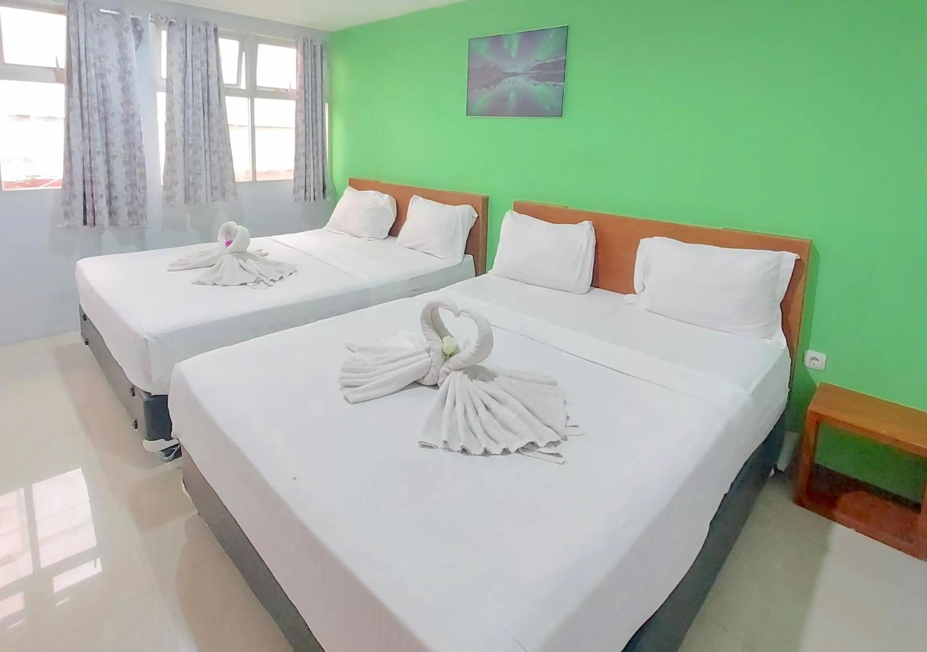 Bed in The Aurora by Makati