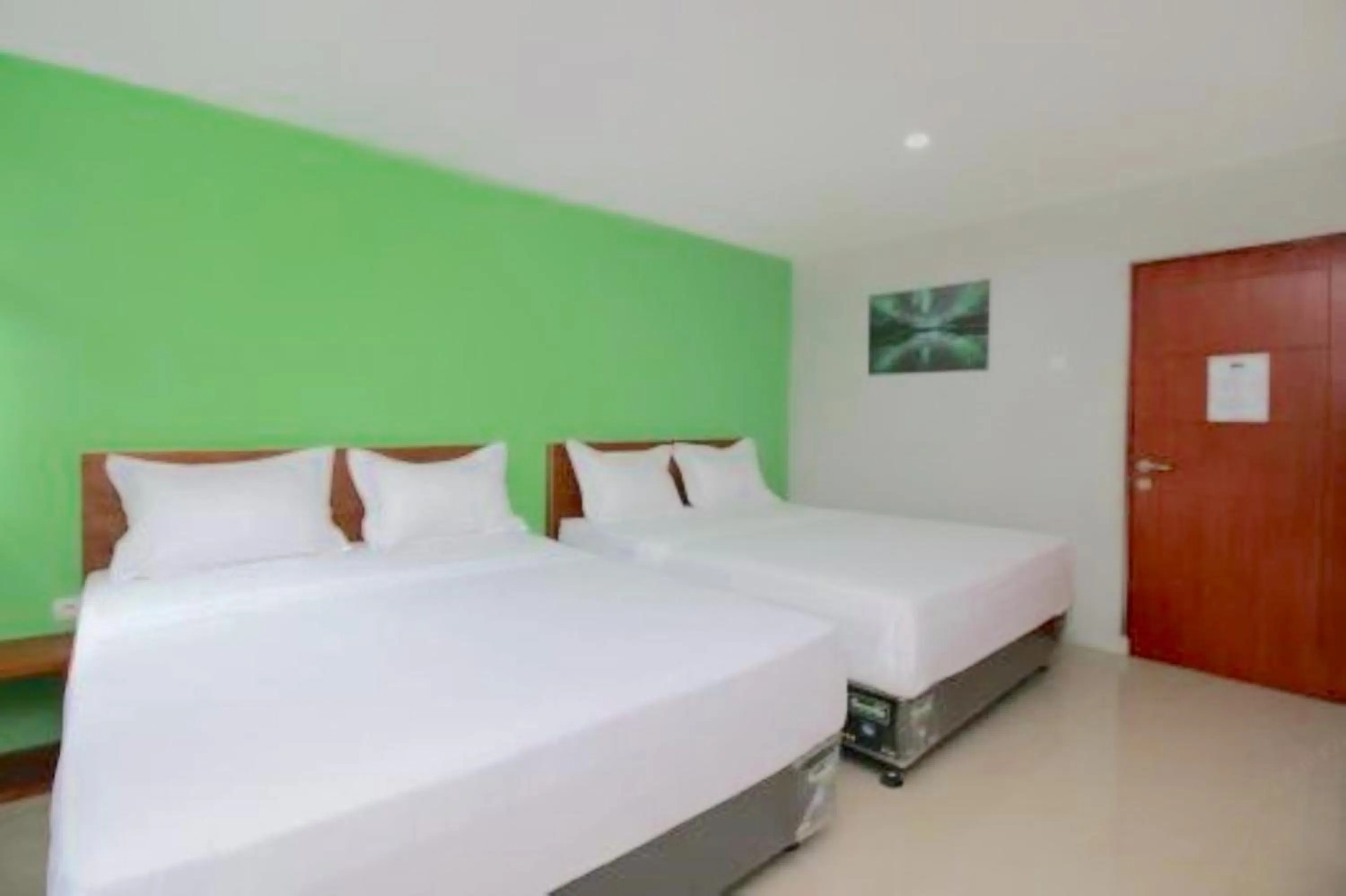 Bed in The Aurora by Makati