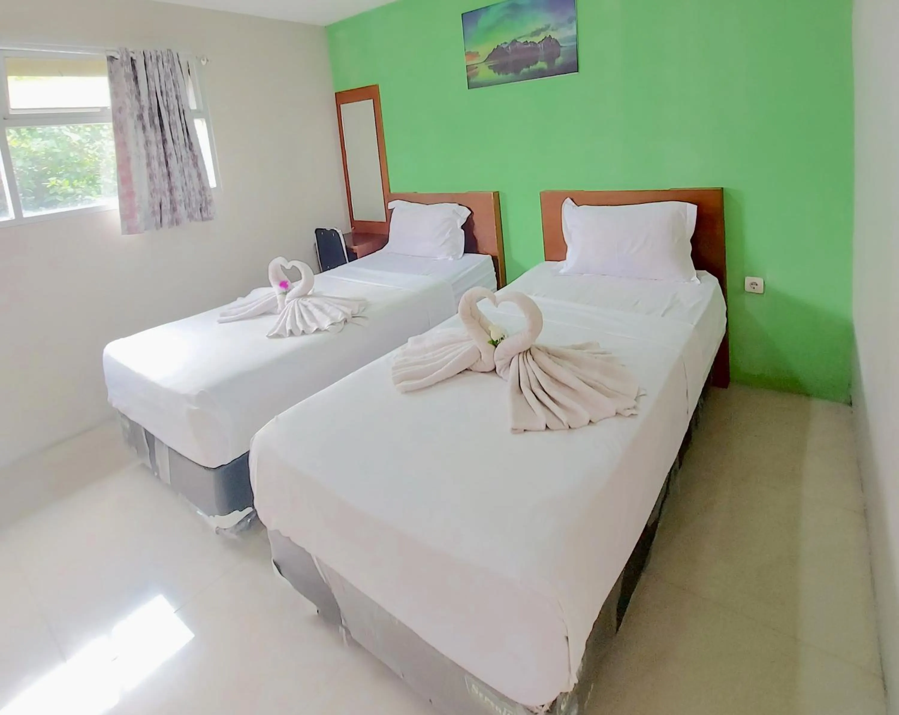 Bed in The Aurora by Makati