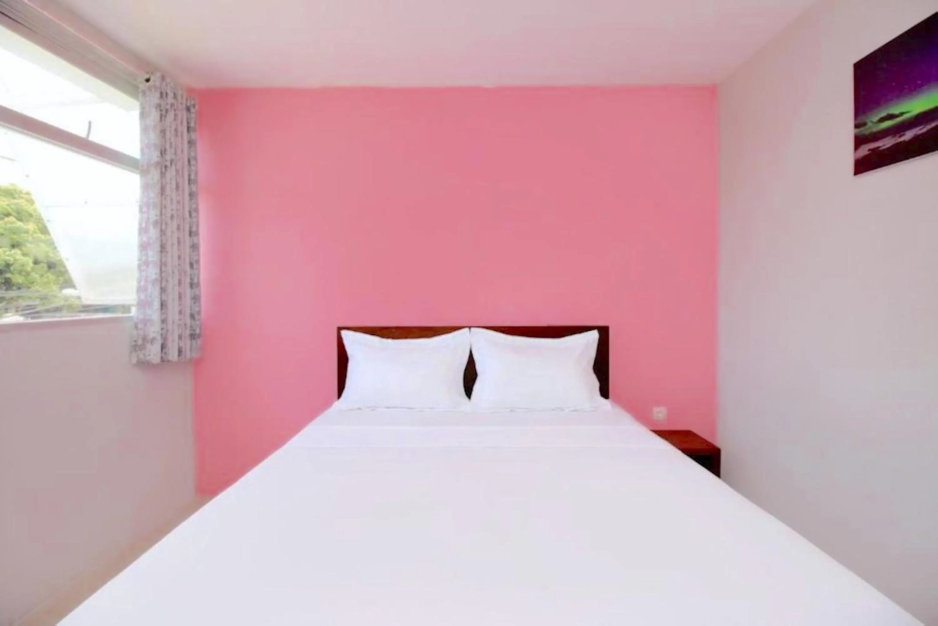 Bed in The Aurora by Makati