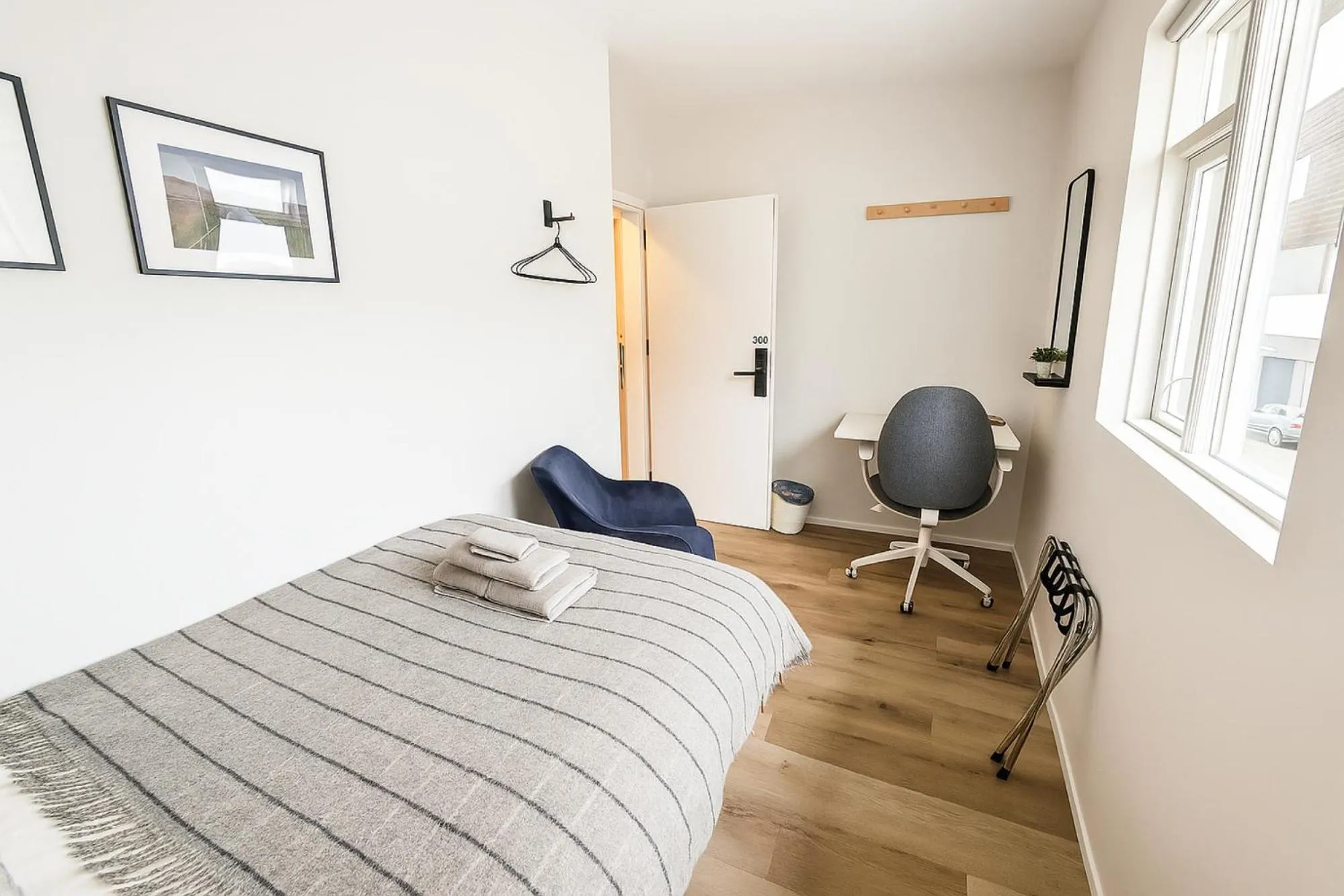 Seating area, Bed in The Ísafjörður Inn by Ourhotels