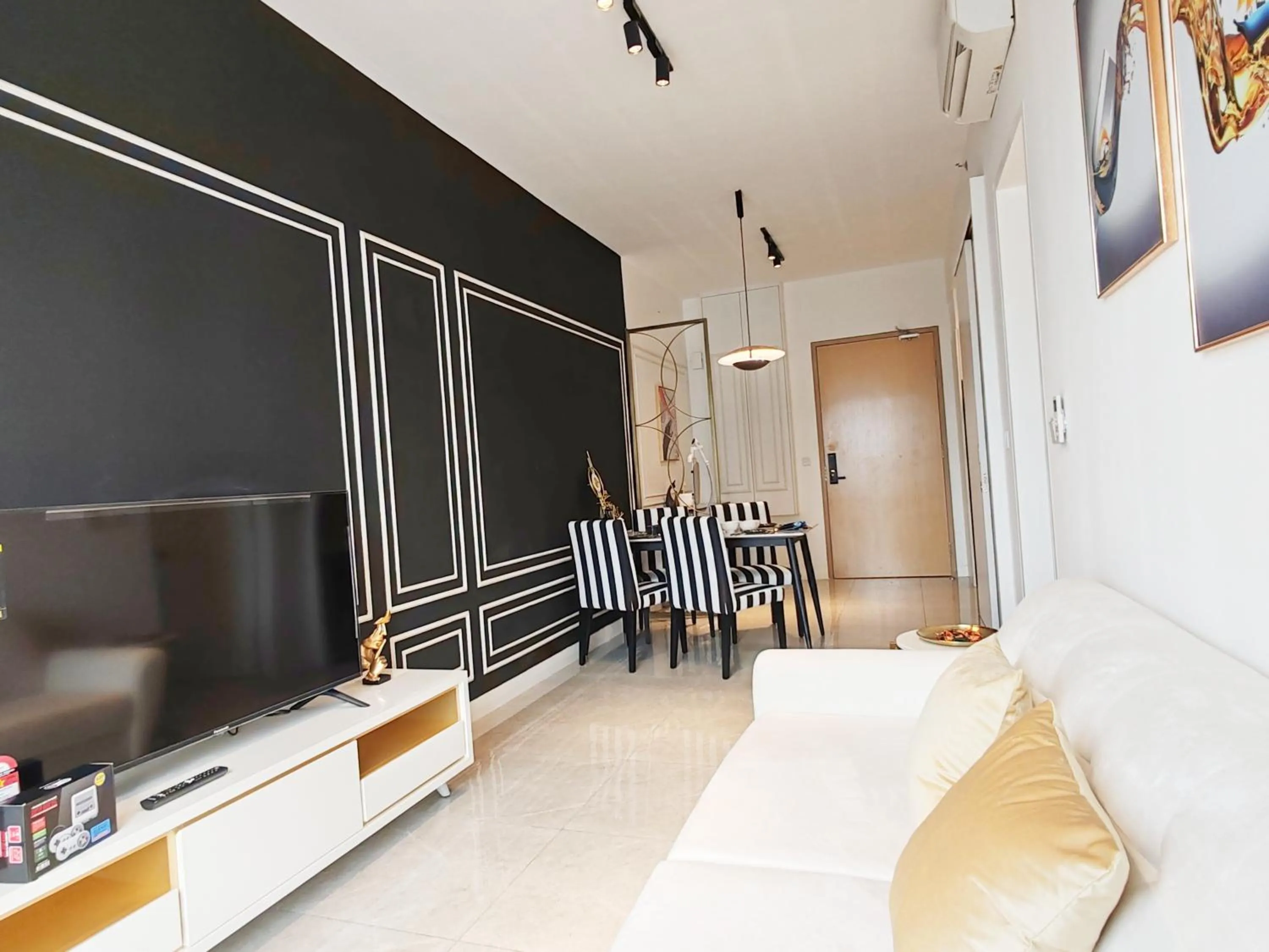 Living room in The Axon Bukit Bintang by SMOVF BNB