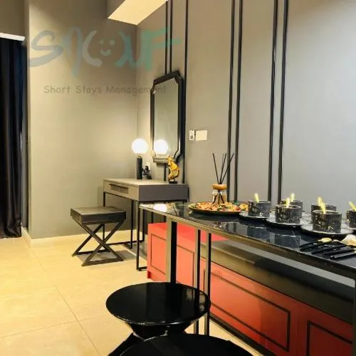 Seating area in The Axon Bukit Bintang by SMOVF BNB