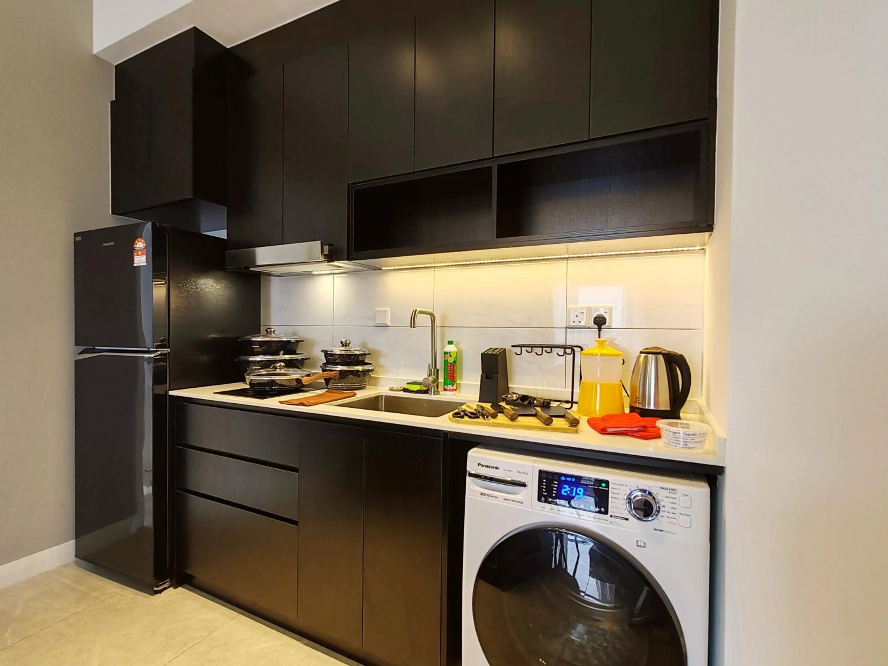 washing machine in The Axon Bukit Bintang by SMOVF BNB