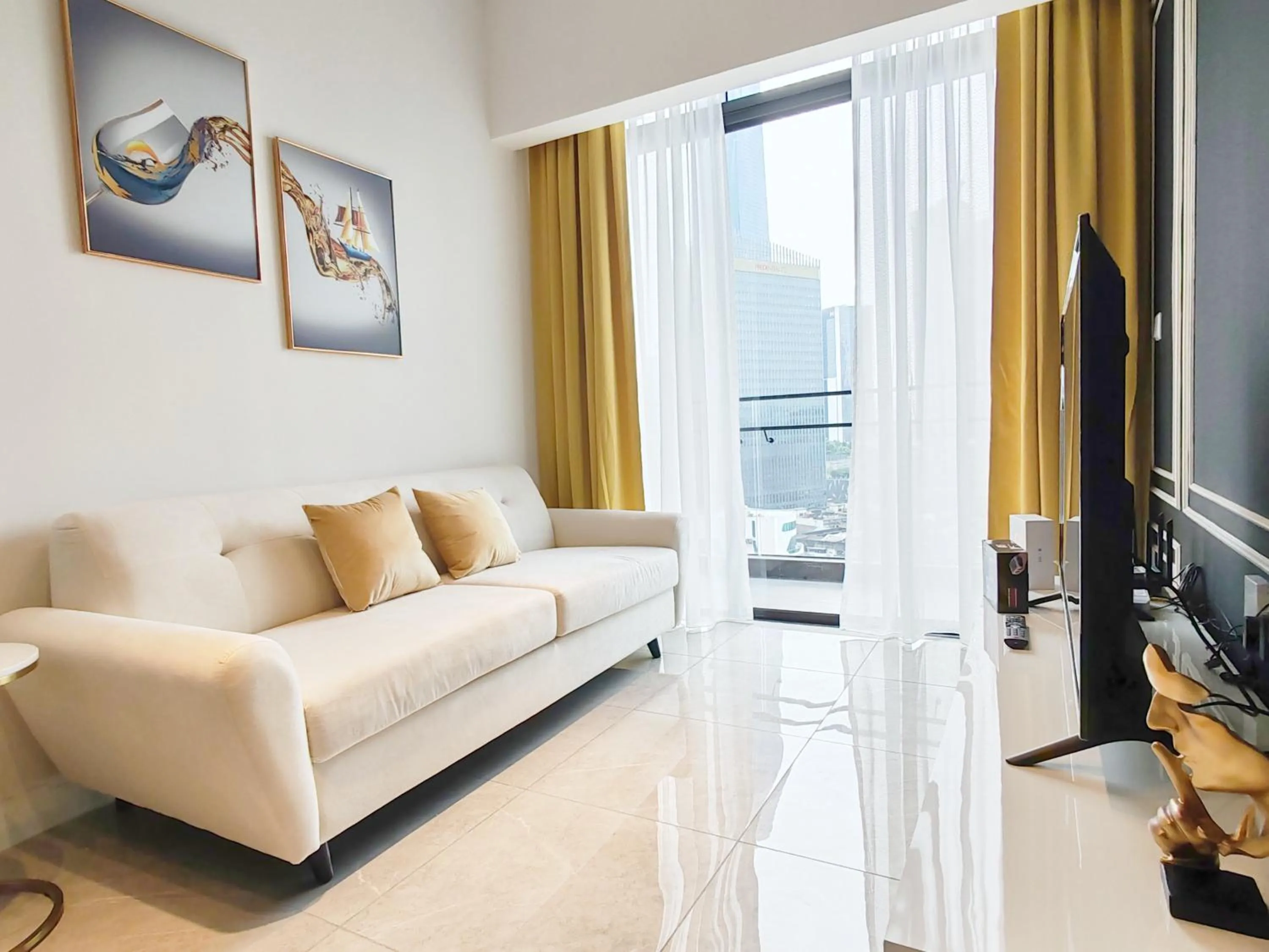 Living room in The Axon Bukit Bintang by SMOVF BNB