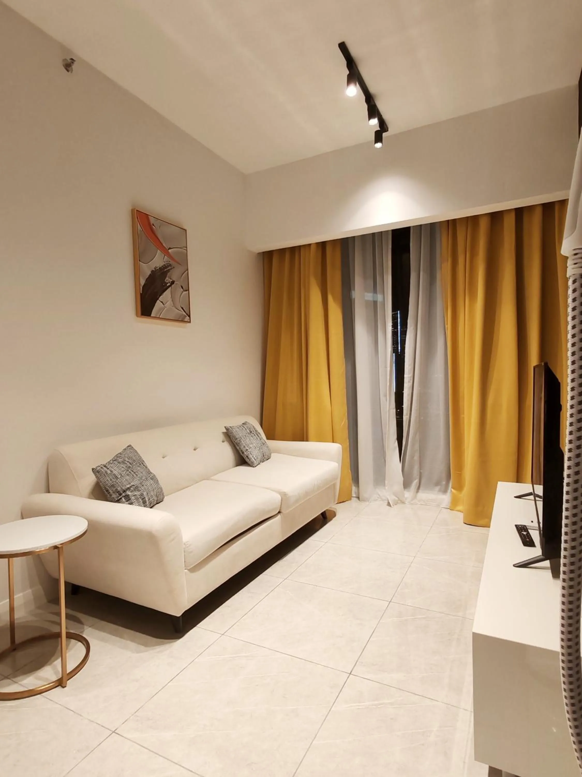 Living room, Bed in The Axon Bukit Bintang by SMOVF BNB