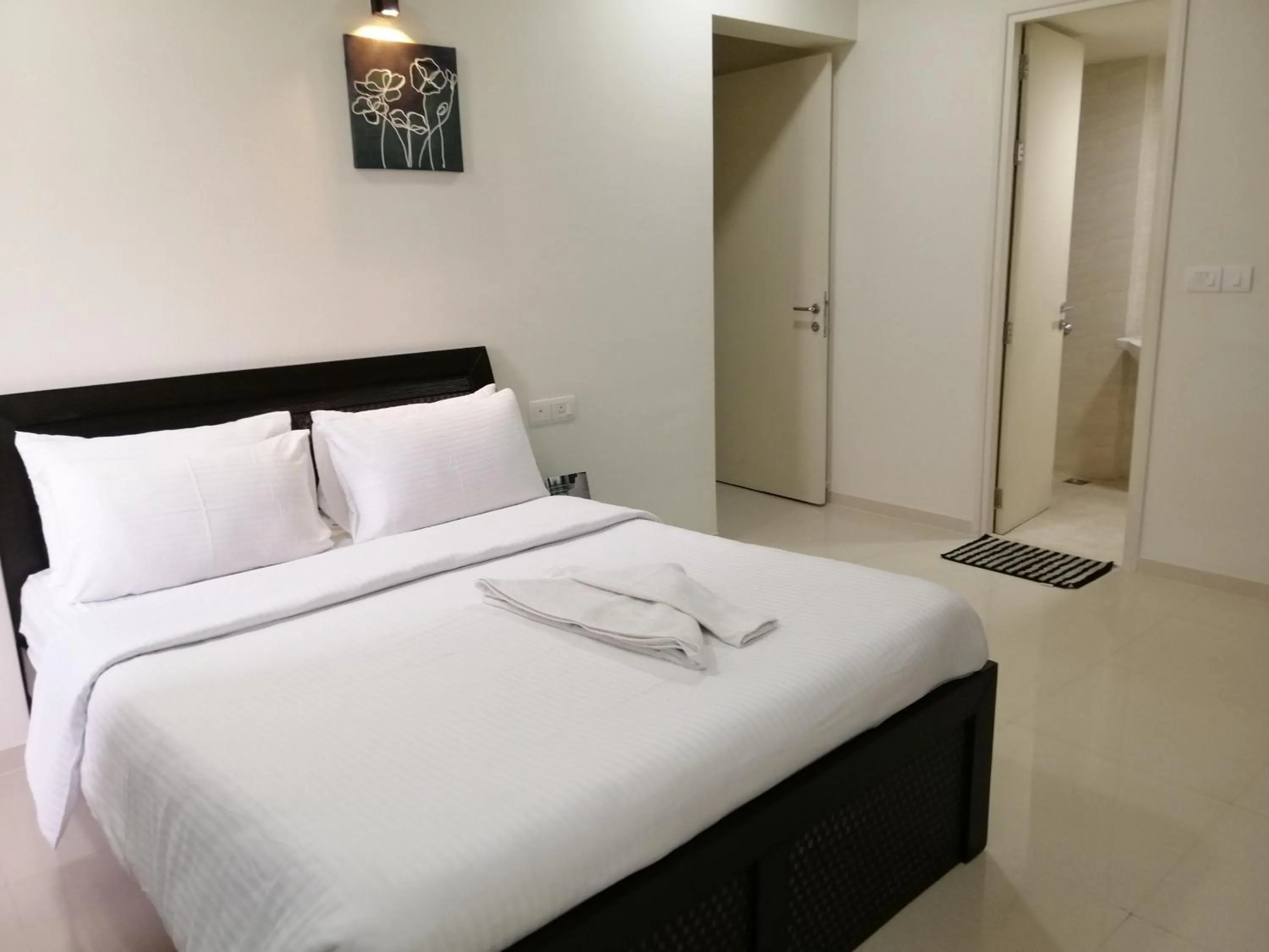 Bed in Apartel by Aarin - Oragadam