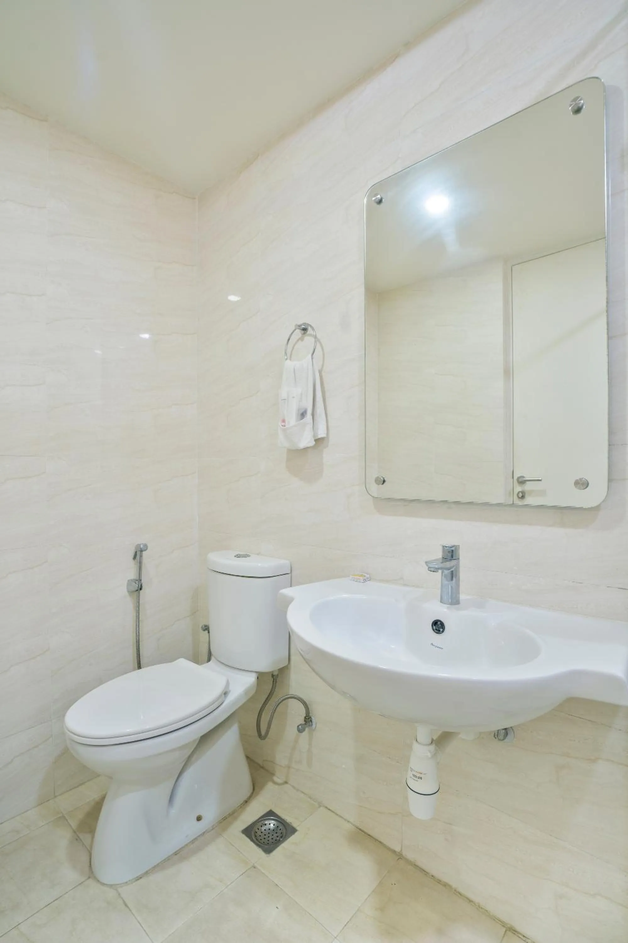 Toilet in Apartel by Aarin - Oragadam