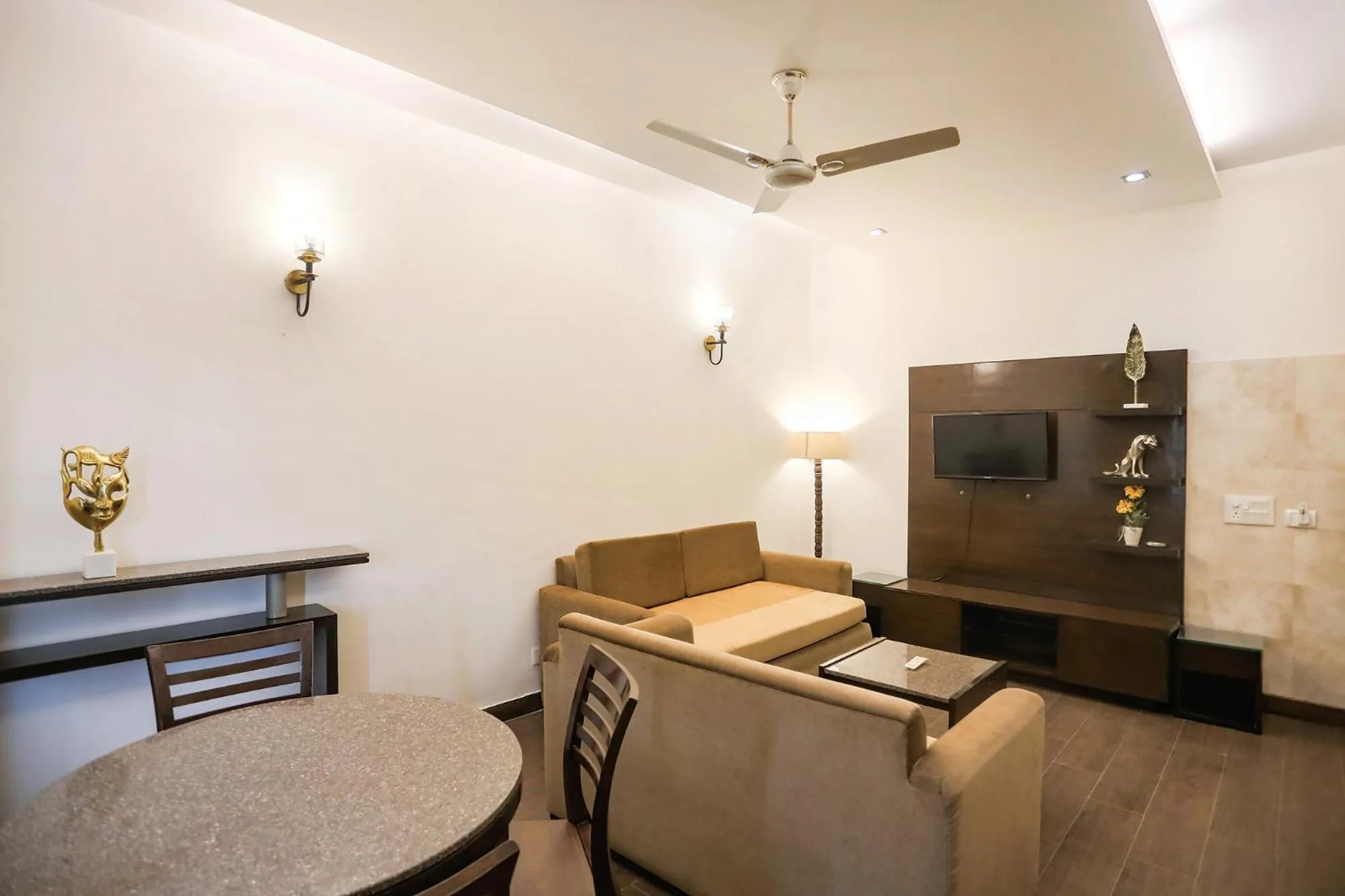 Seating area in FabHotel Rivlet Residency