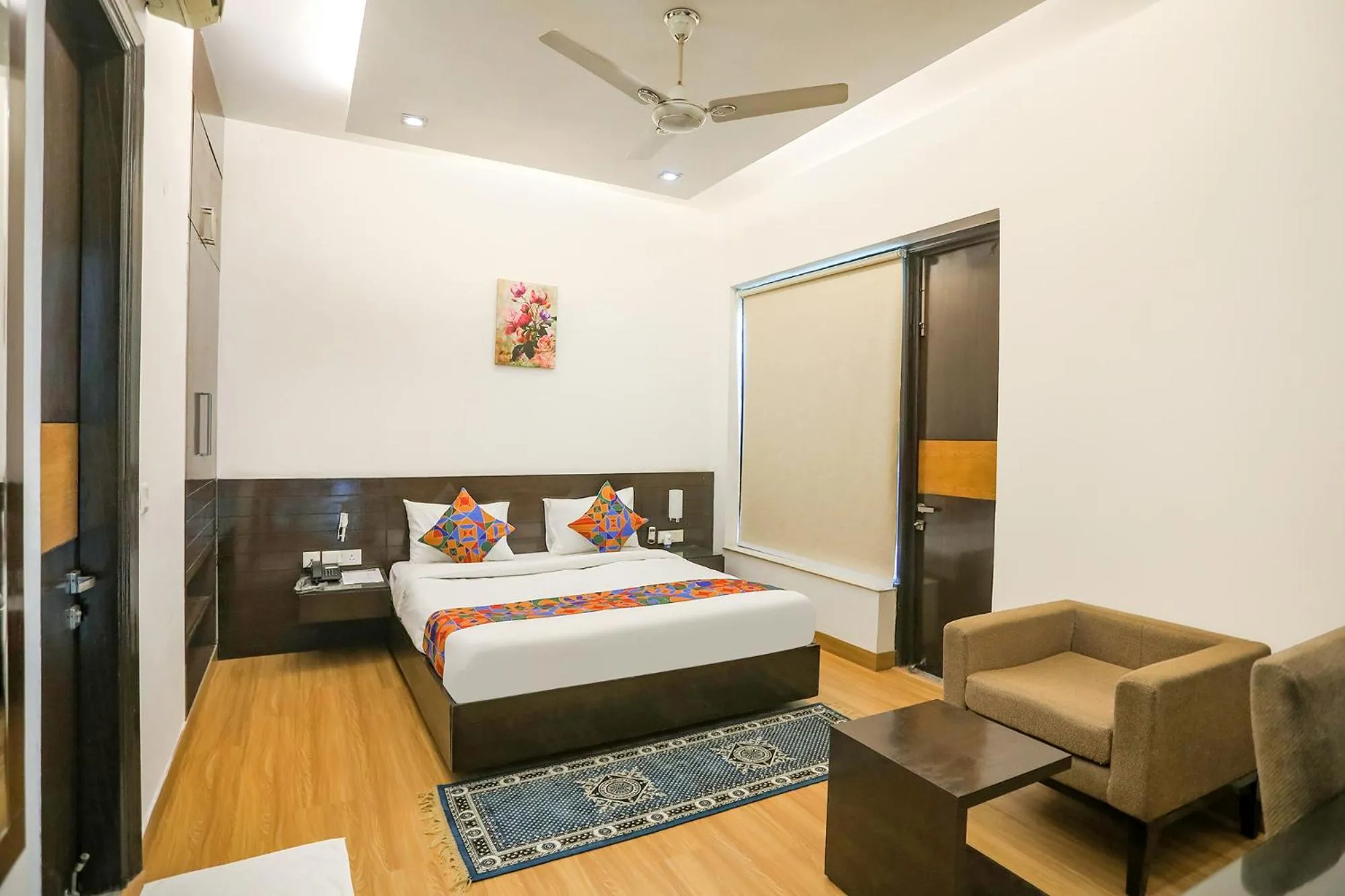 Living room, Bed in FabHotel Rivlet Residency