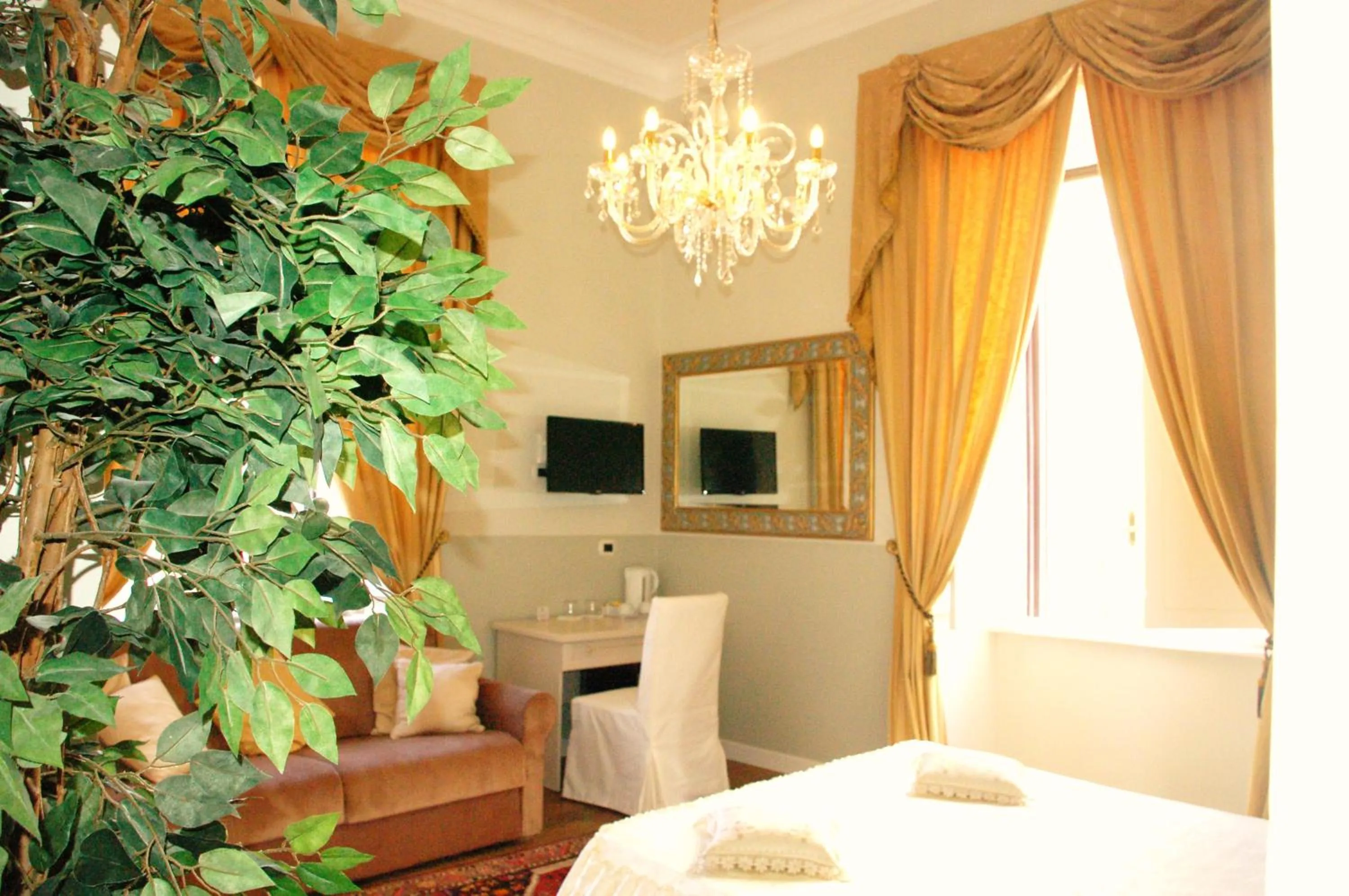 Bed in Charme Holidays Colosseum