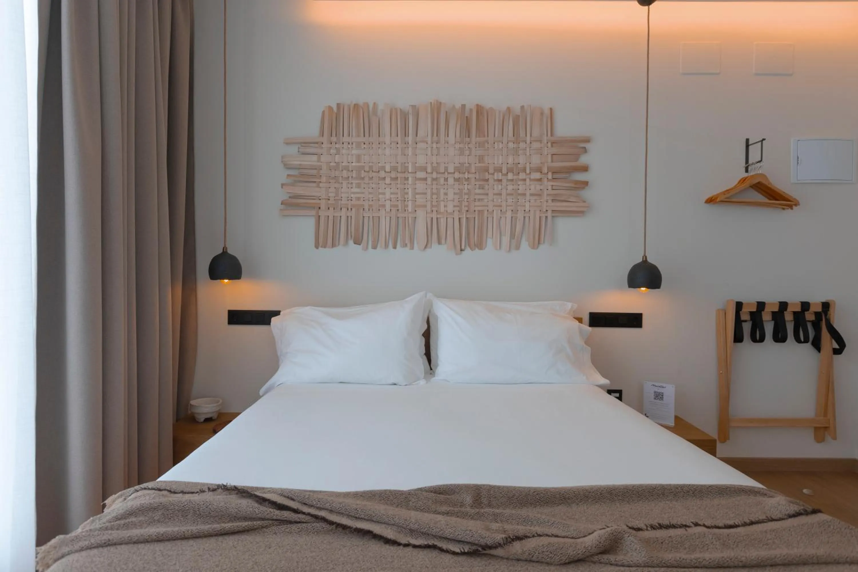Bed in Malates Slow Boutique Hotel