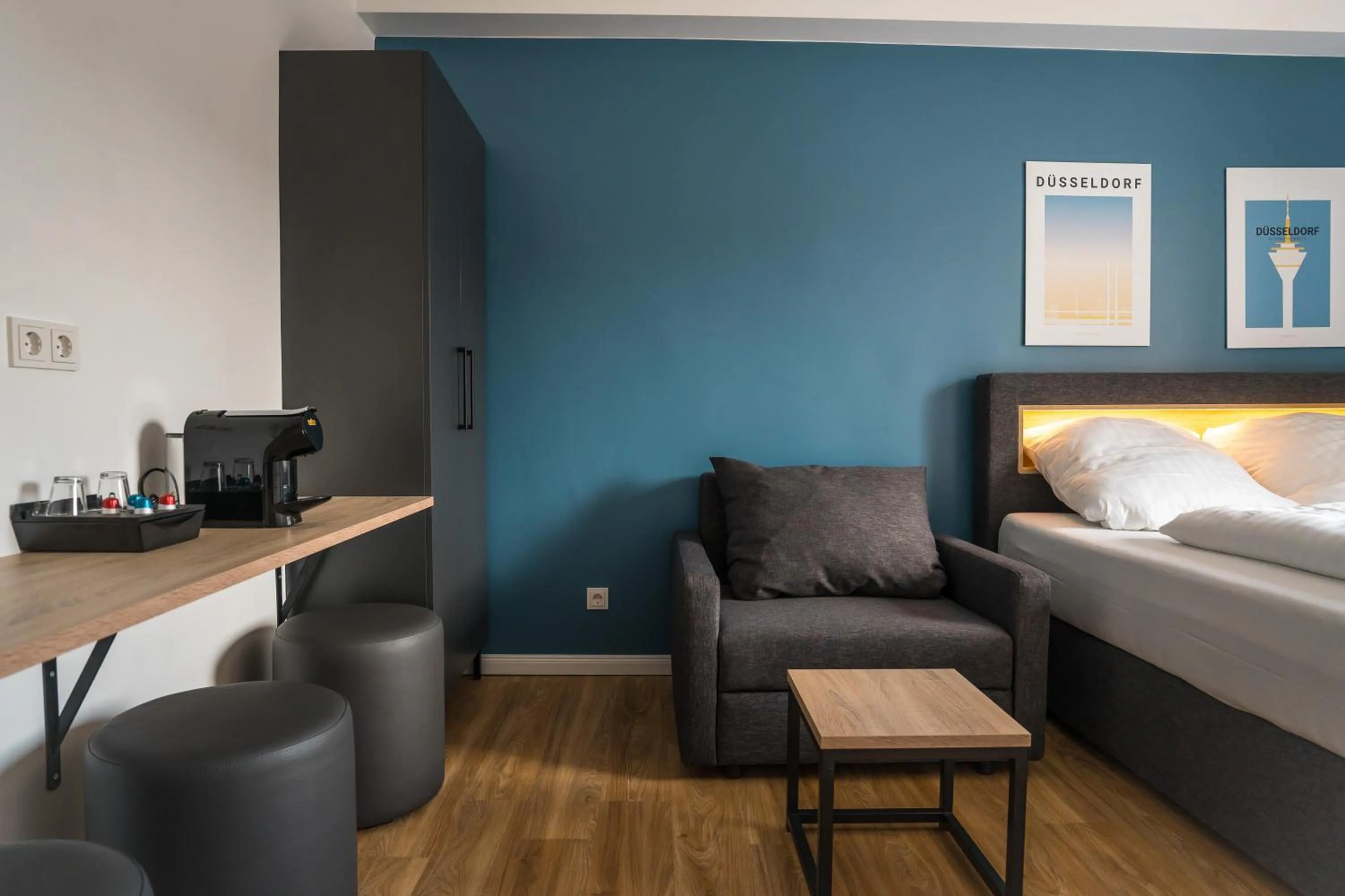 Bed in Antares Apartments