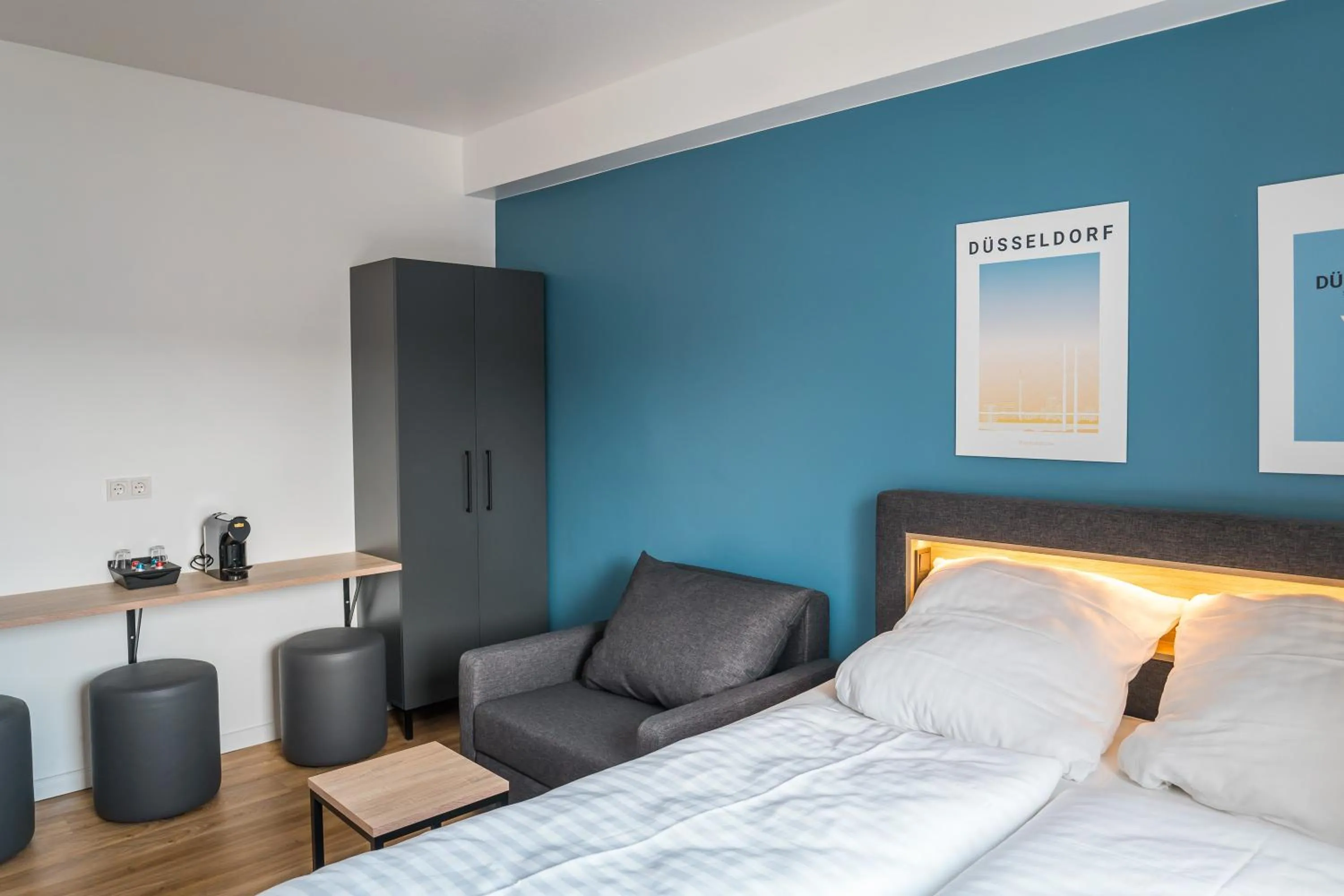 Bed in Antares Apartments