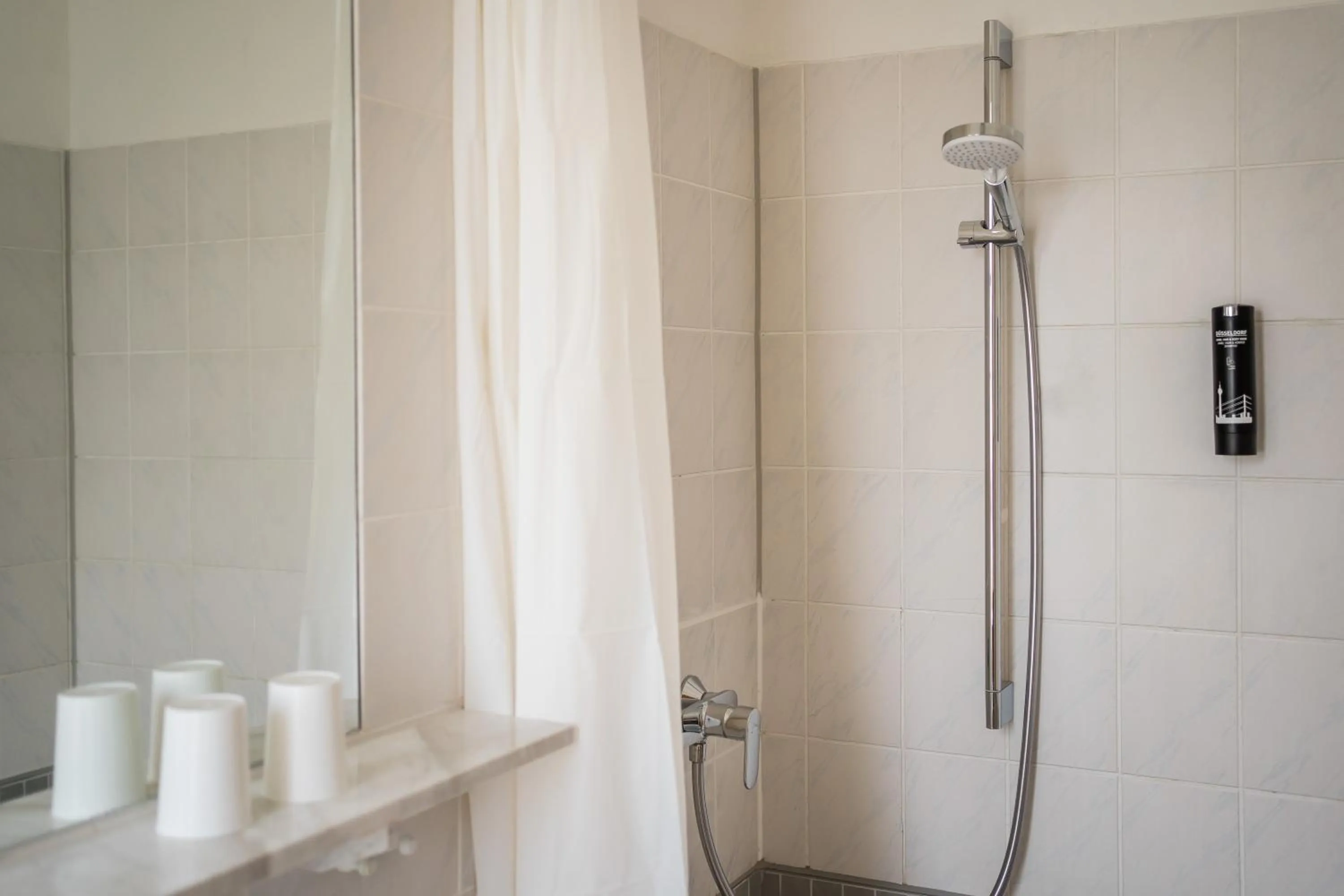 Shower in Antares Apartments