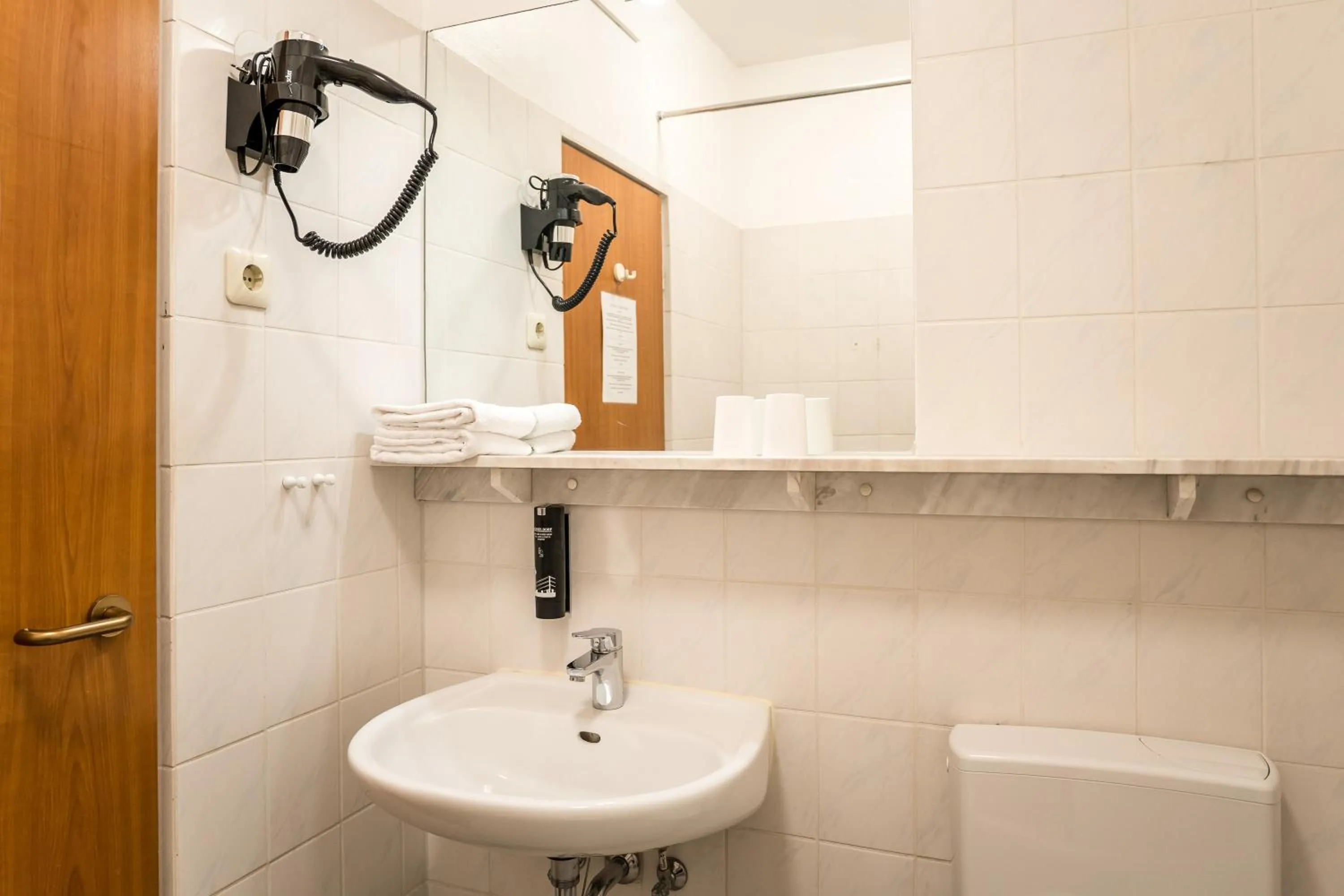 Toilet in Antares Apartments