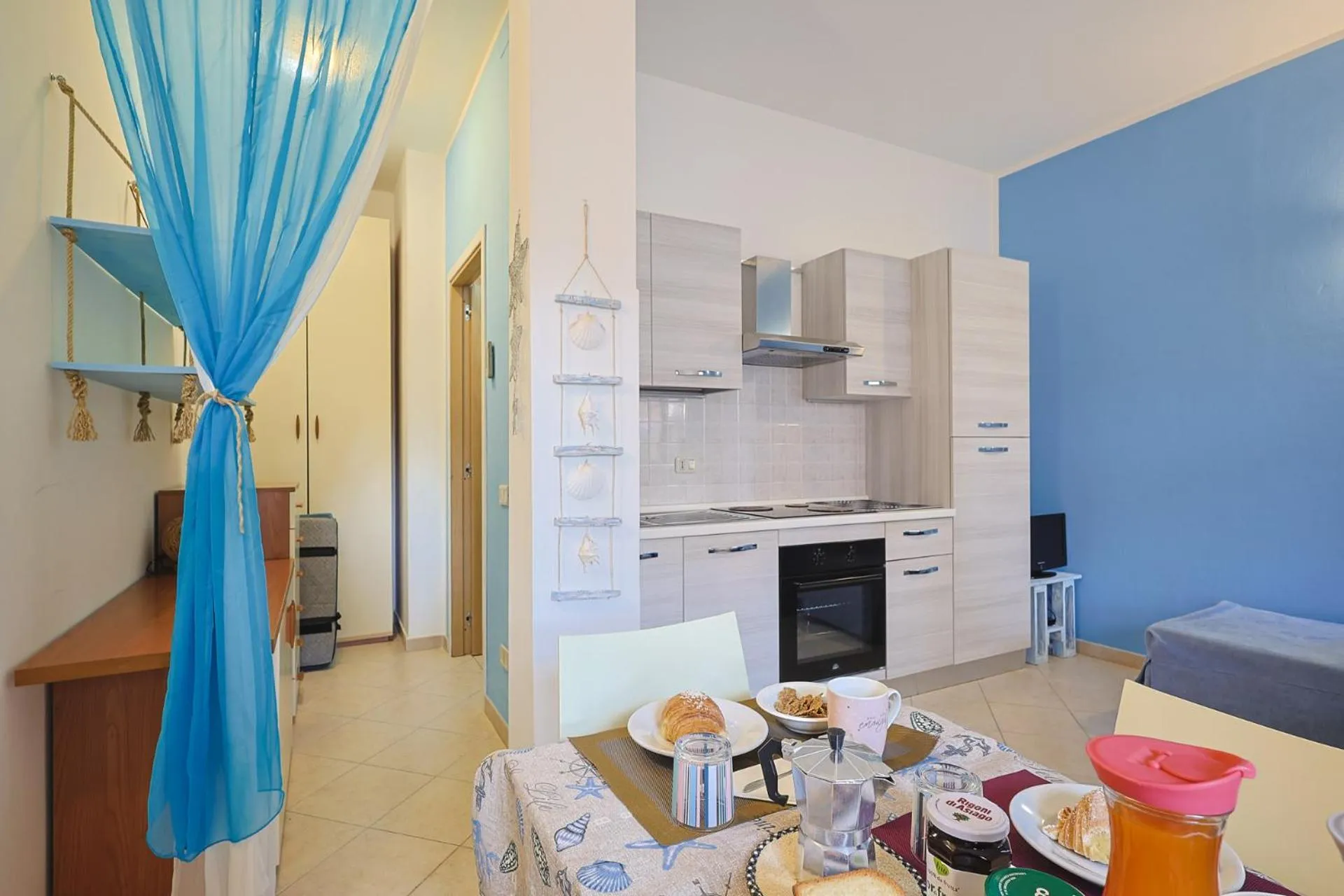 Kitchen or kitchenette in Pineta Azzurra