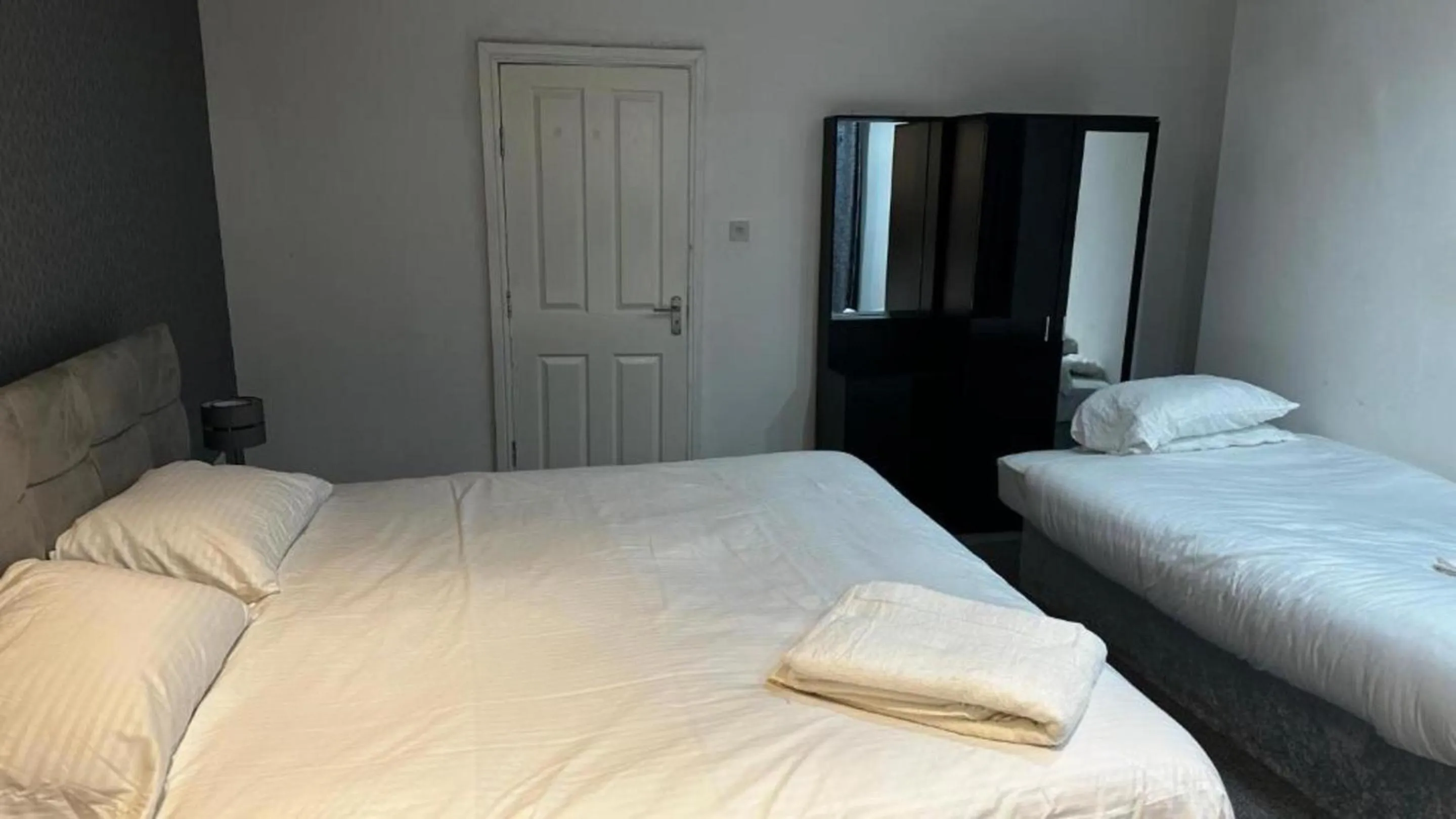 Photo of the whole room, Bed in OYO The Pleasant House