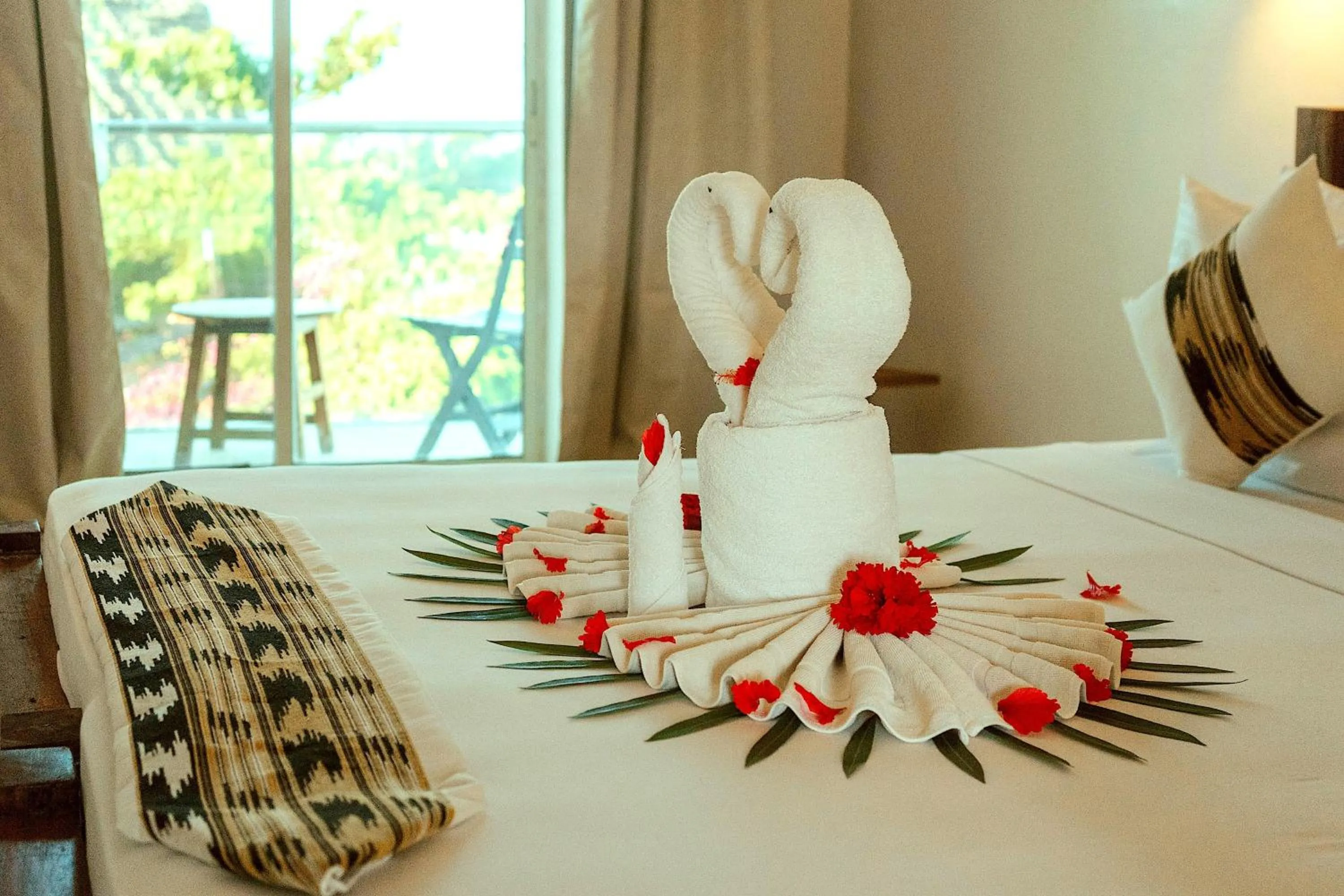 Photo of the whole room, Bed in La Perla Beach Resort, Zanzibar - Your Beachfront Private Haven