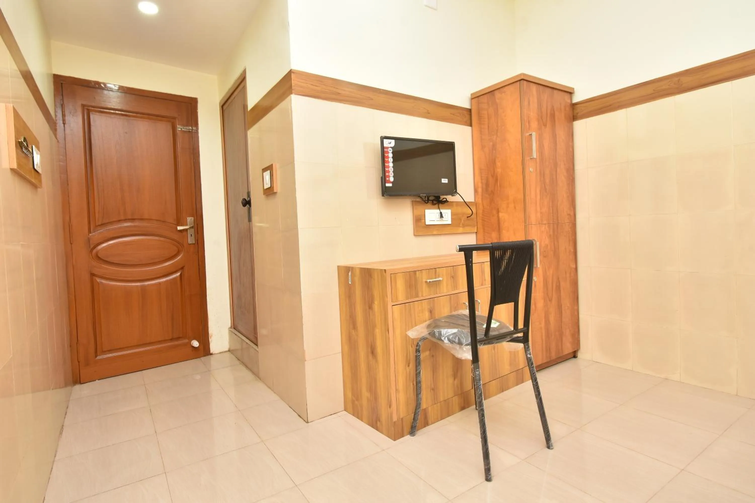 TV and multimedia in HOTEL KANNUR CAPITAL CALTEX