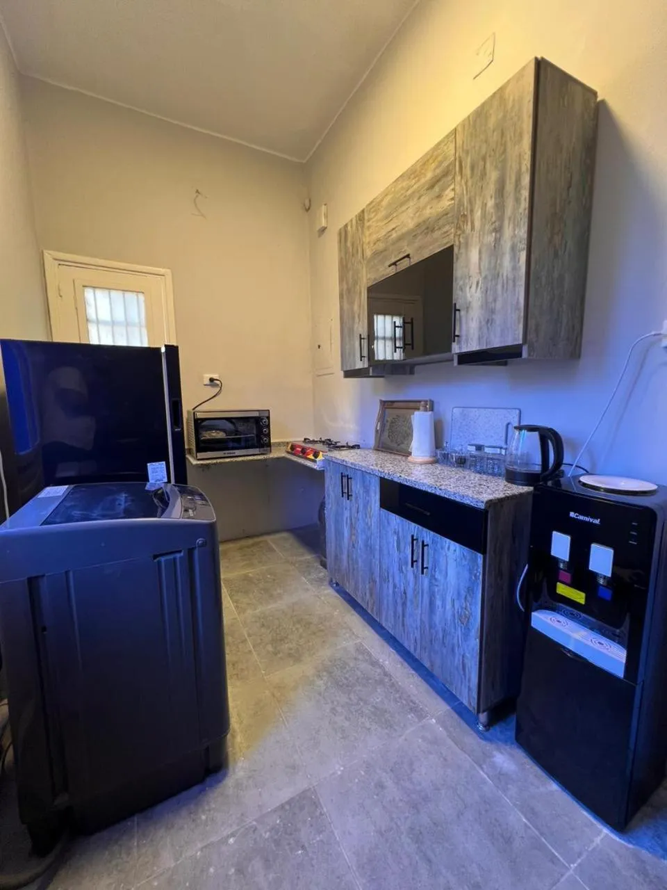 Kitchen or kitchenette in downtown Family Suites