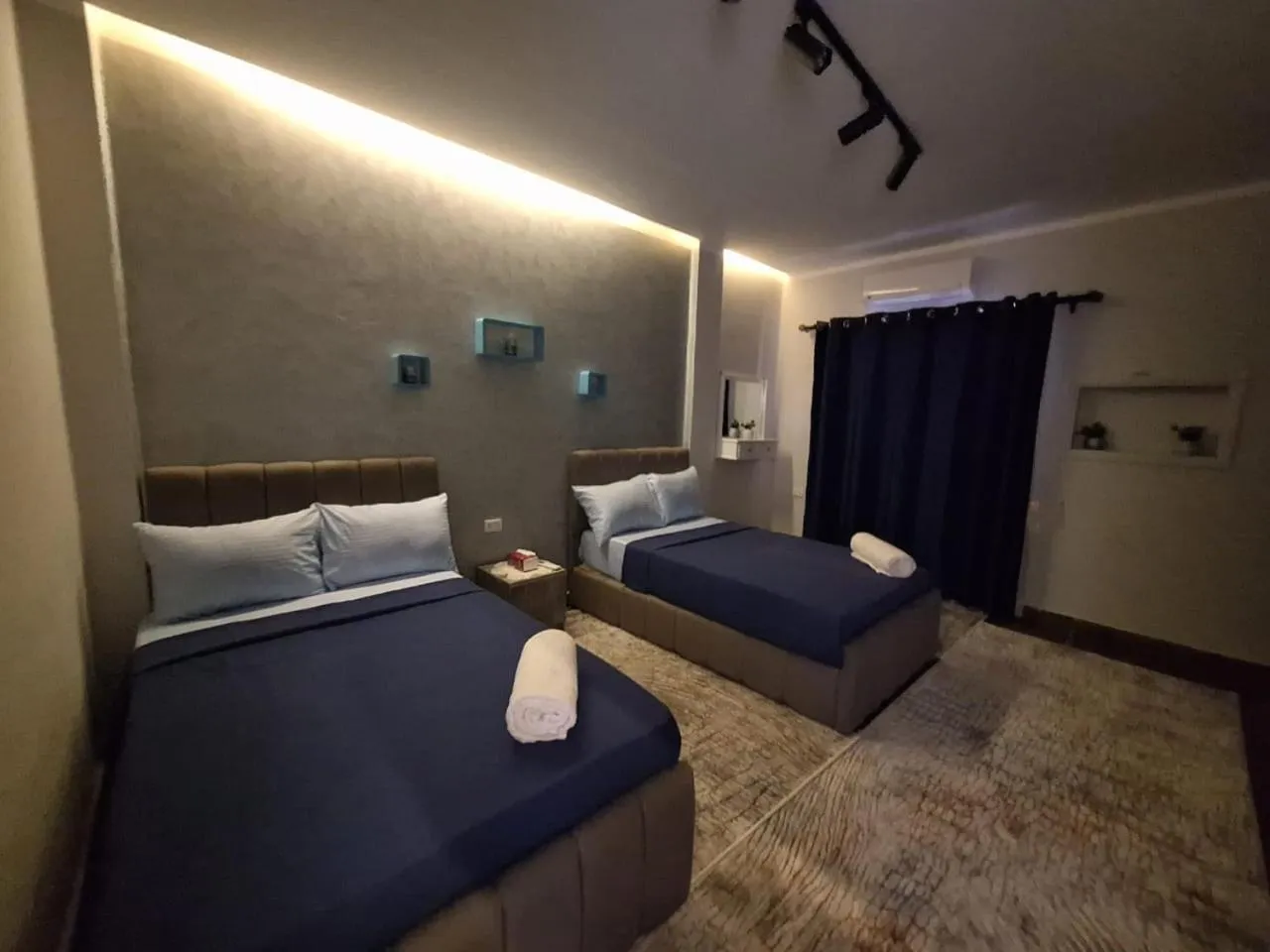 Bedroom, Bed in downtown Family Suites