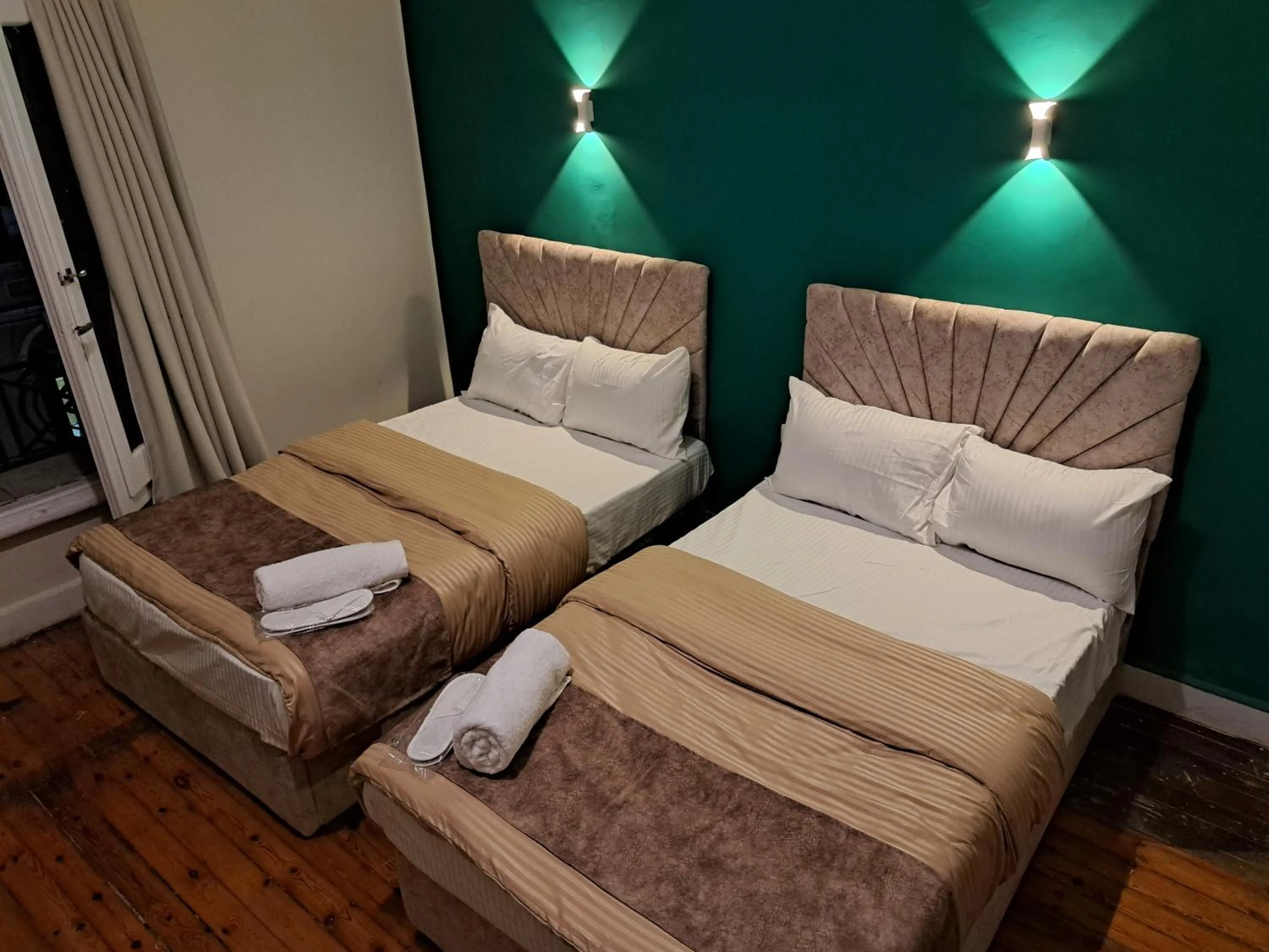 Bedroom, Bed in downtown Family Suites